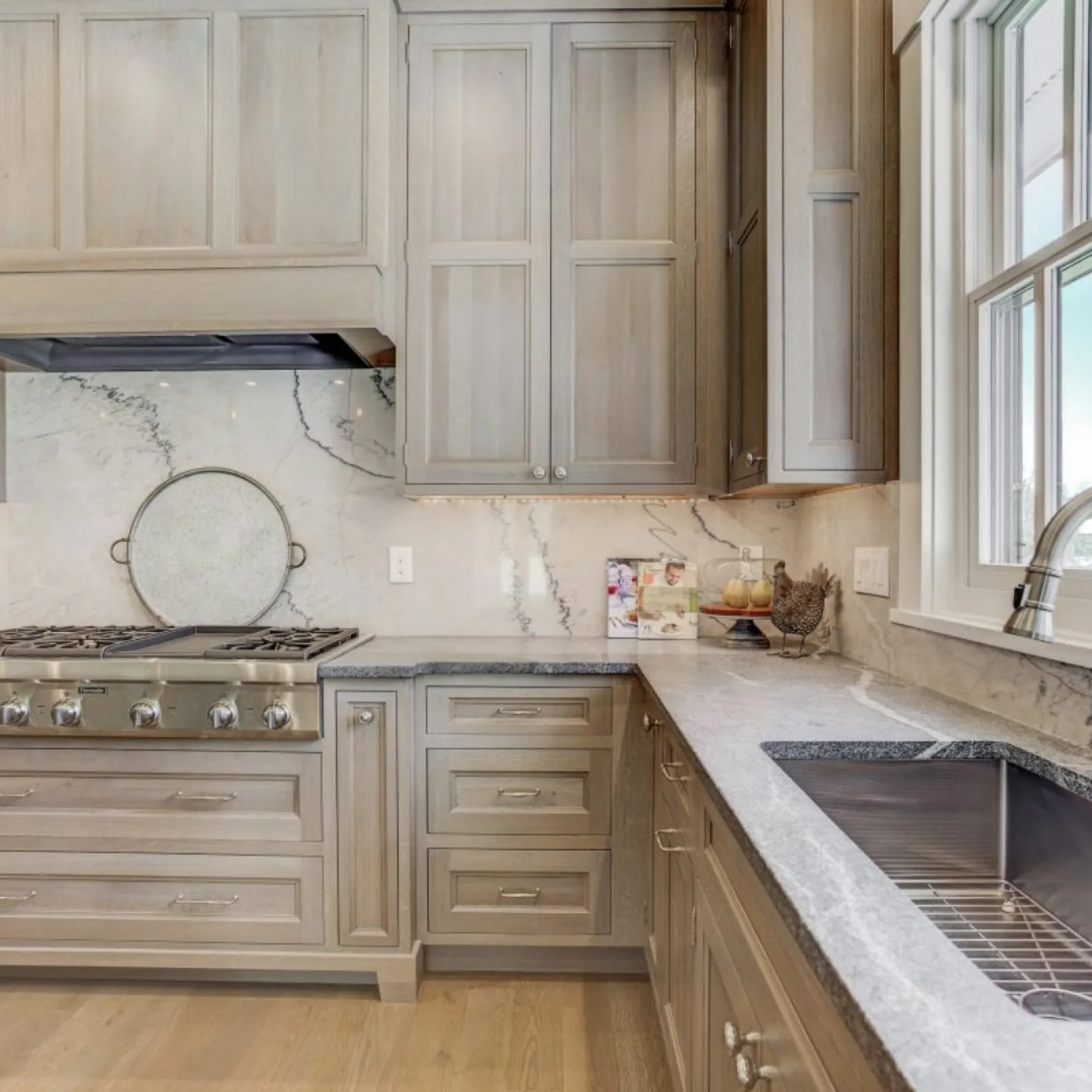 a kitchen with white cabinets