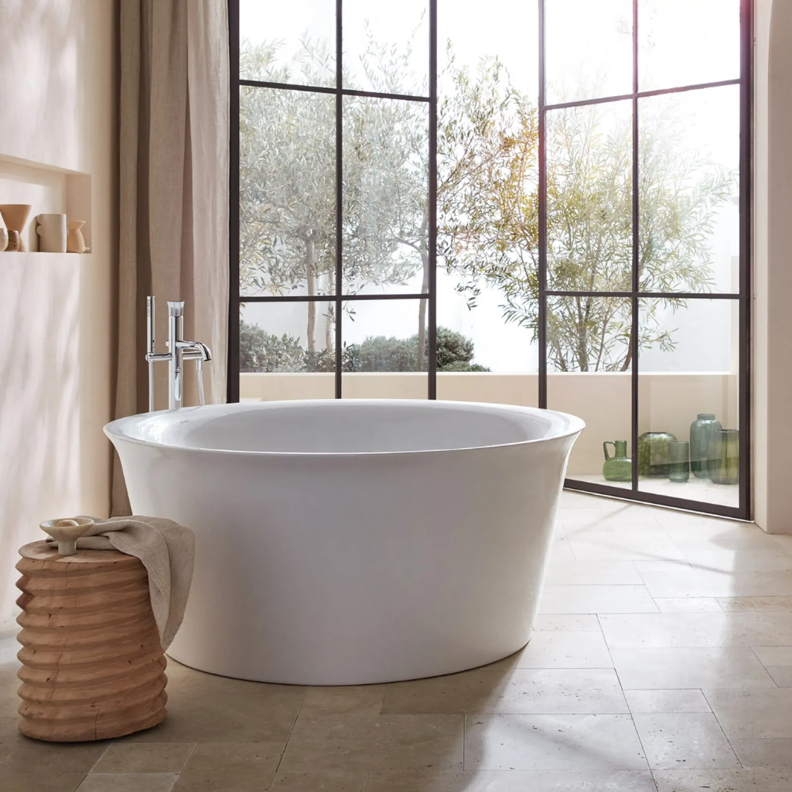 a white bathtub in a bathroom