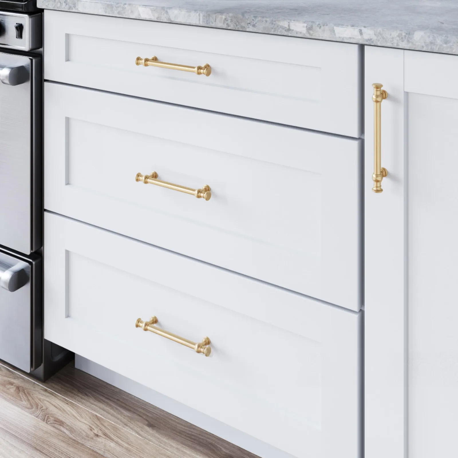 a white dresser with a gold handle