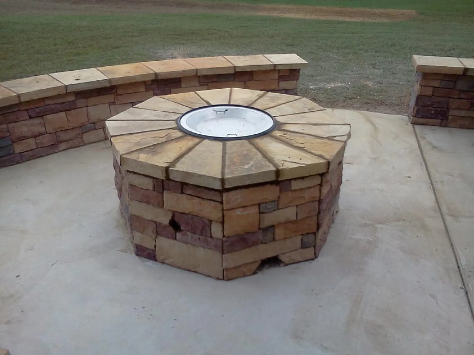 a brick oven on a brick patio