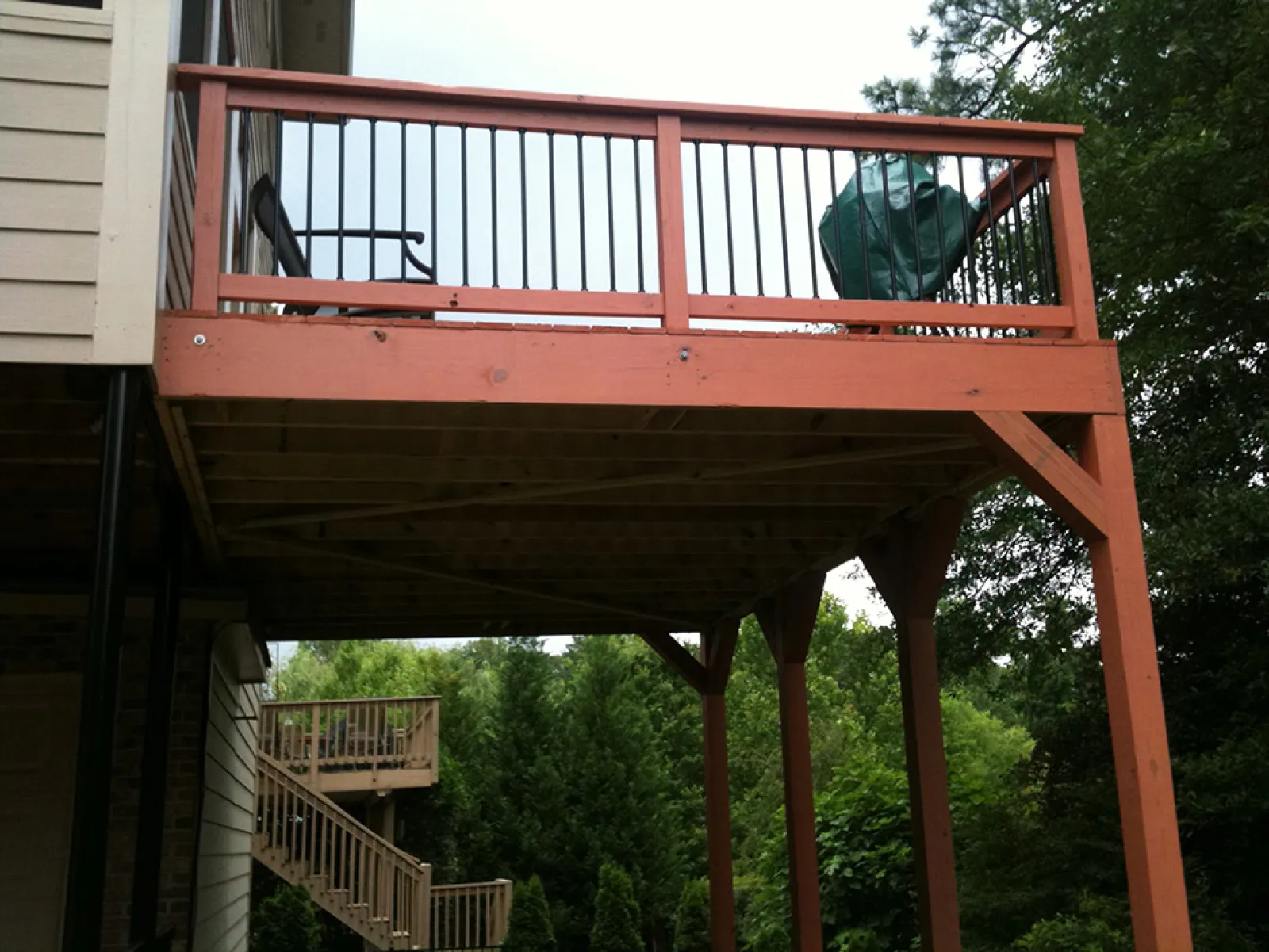 a wooden structure with a railing