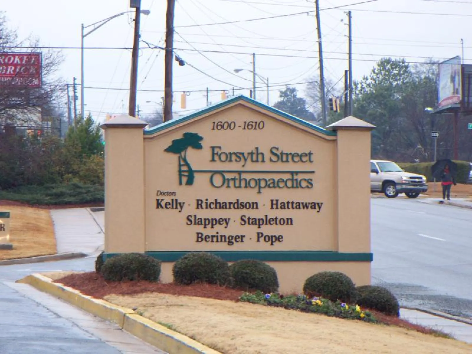 Entrance sign for Forsyth Street Orthopaedics listing multiple doctors at 1600-1610 address.