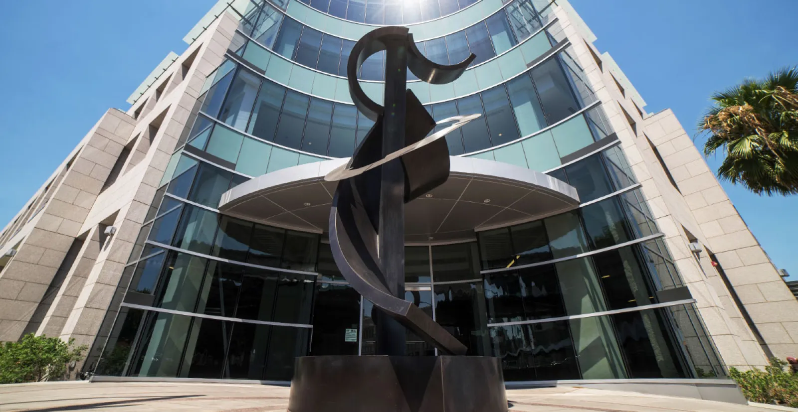 a statue in front of a building