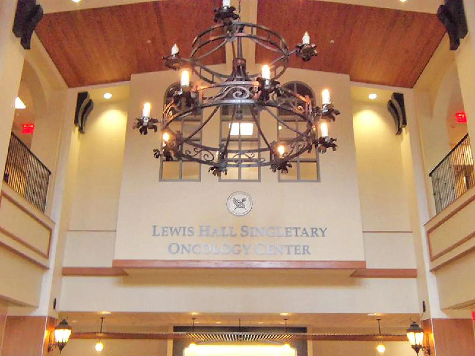 Interior of Lewis Hall Singletary Oncology Center with chandelier and high ceiling.