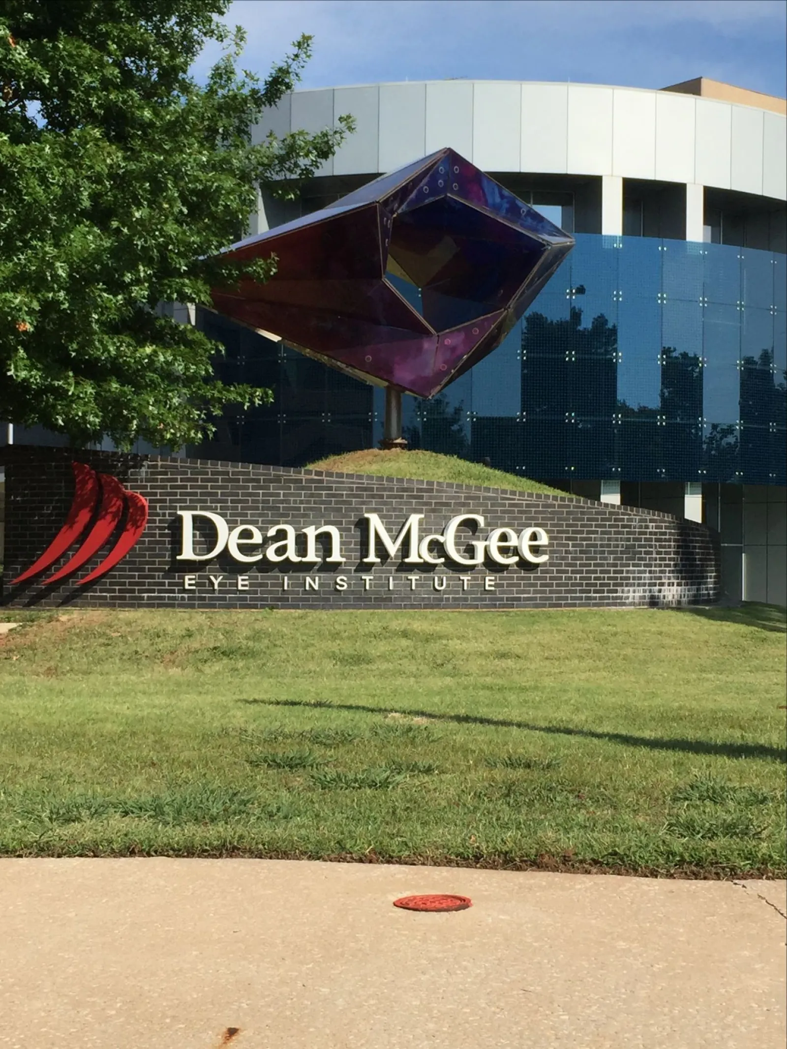 a sign in front of a building