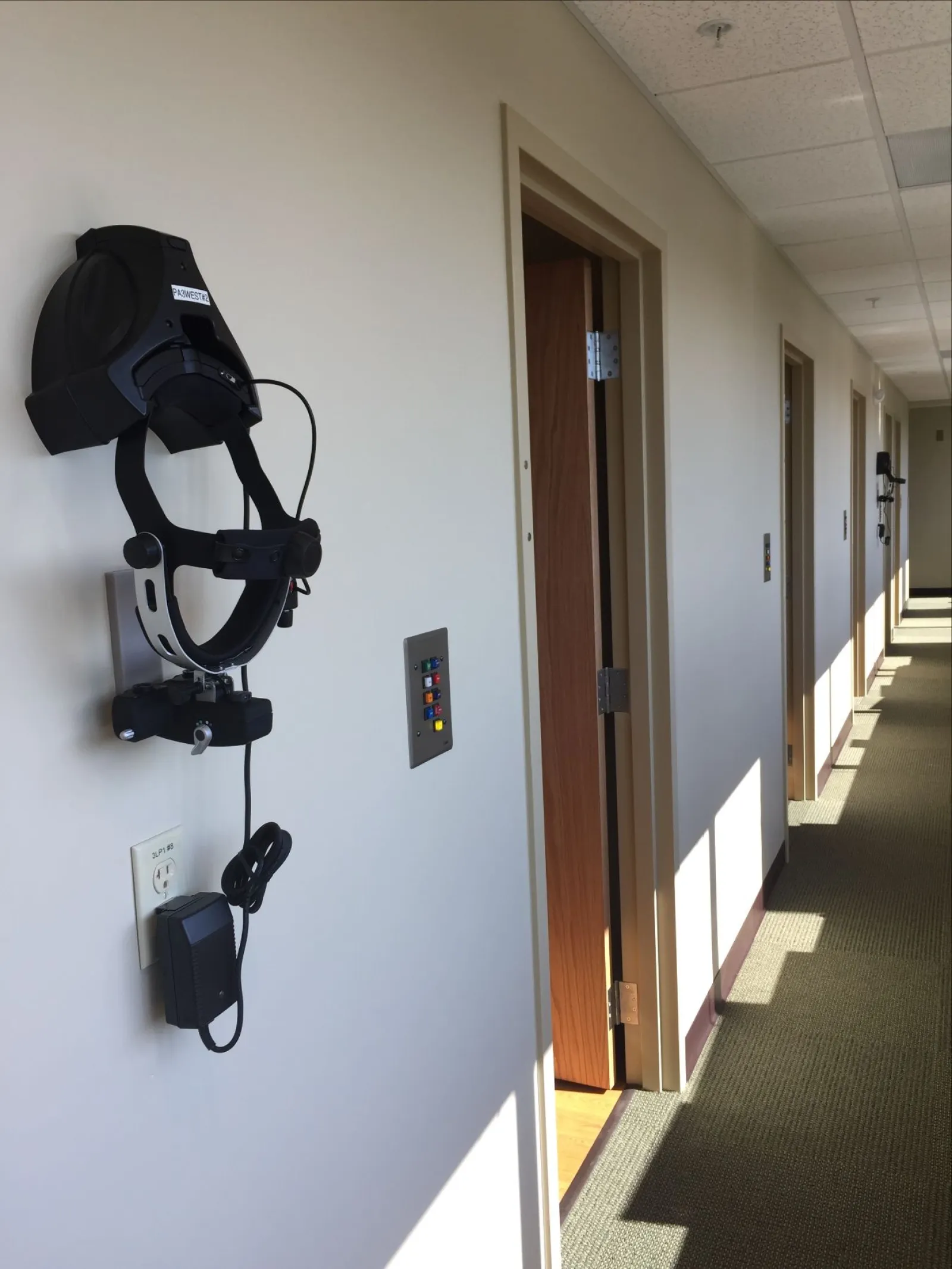 a hallway with a camera on the wall