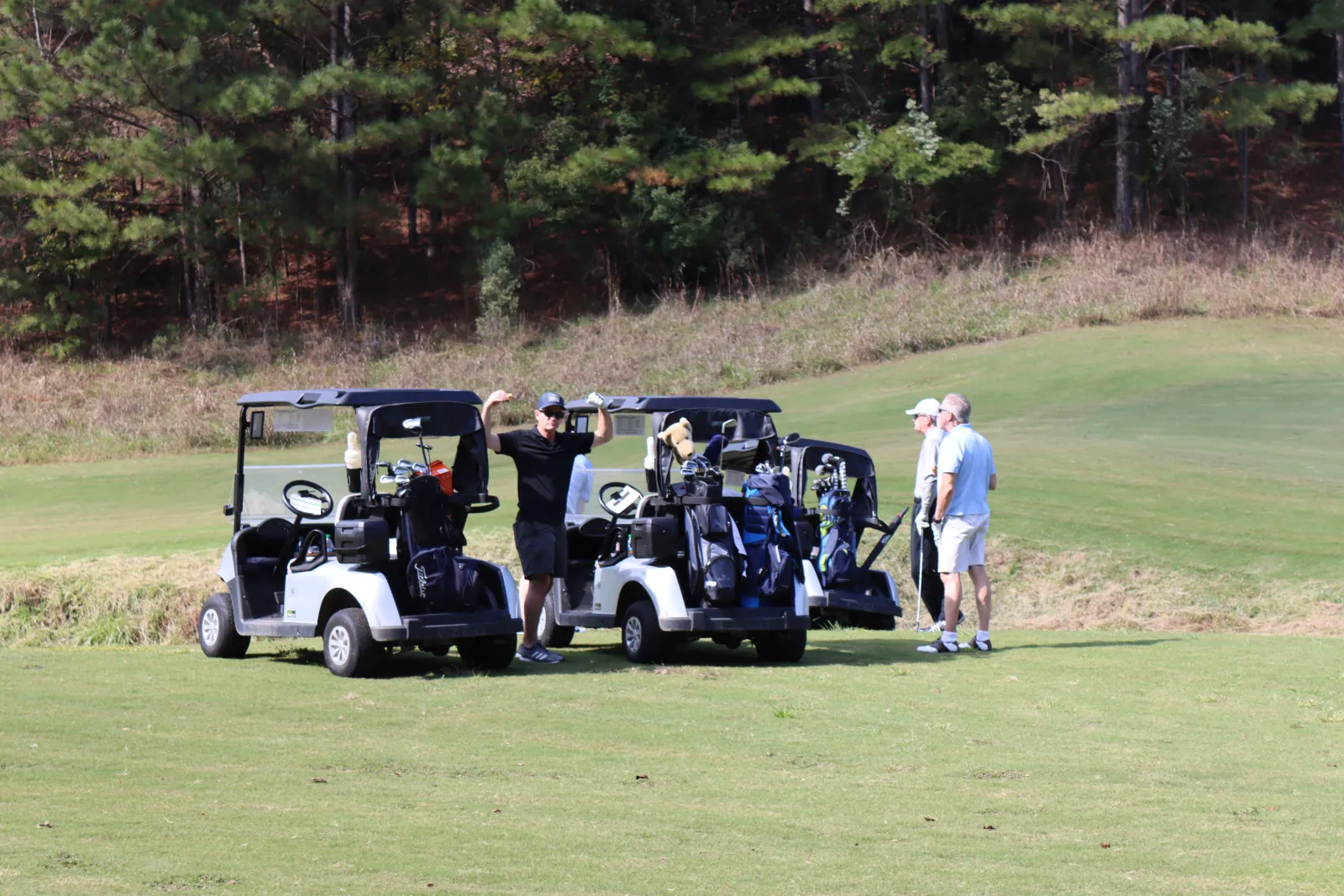 a group of people playing golf