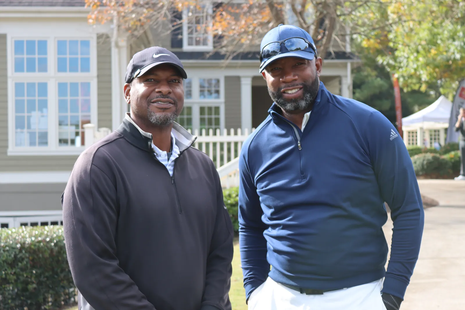 a couple of men wearing helmets