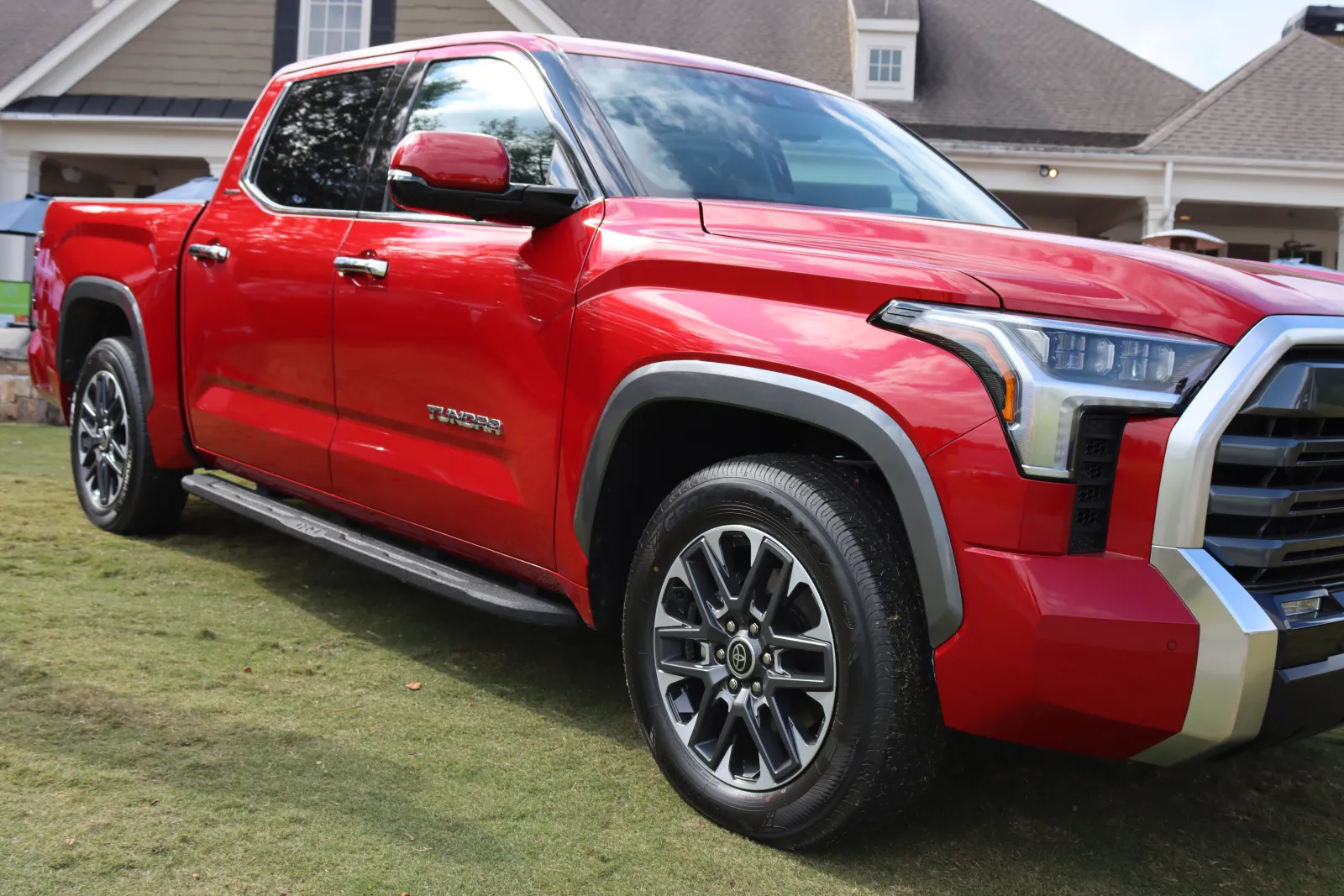 a red car parked in a driveway