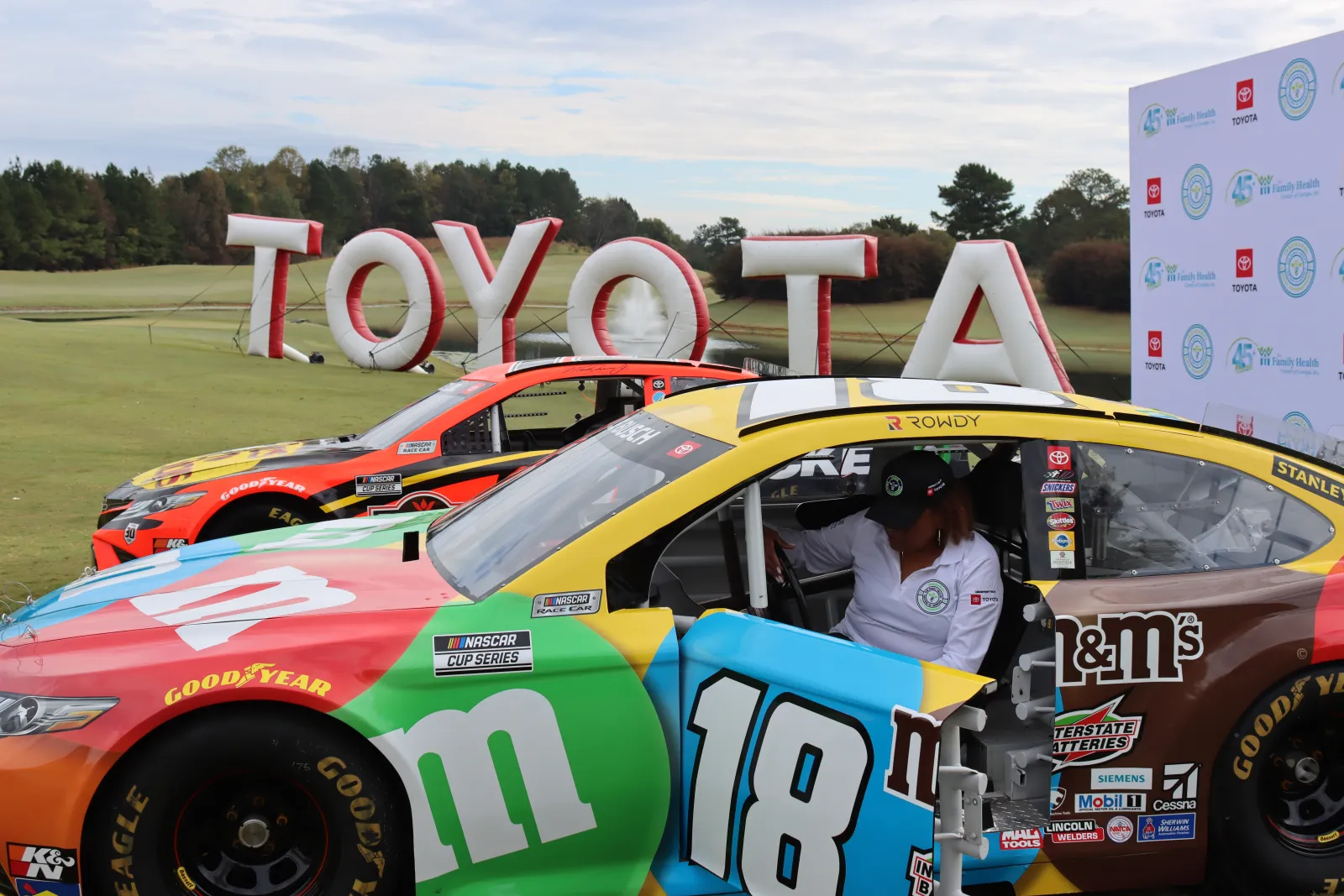 a person driving a race car