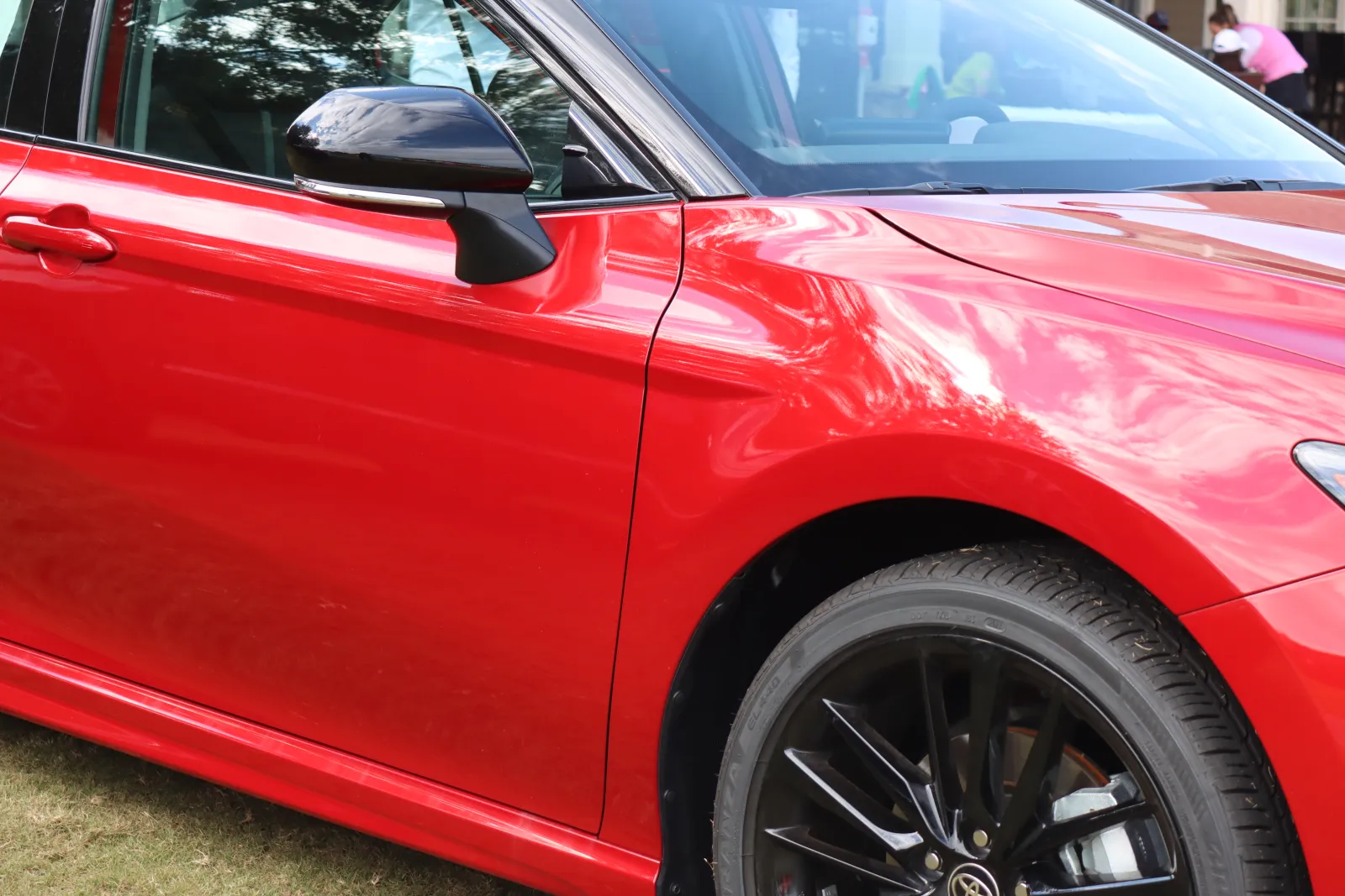 a red car with a black rim