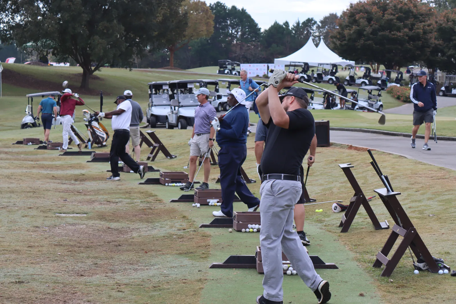 a group of people playing golf