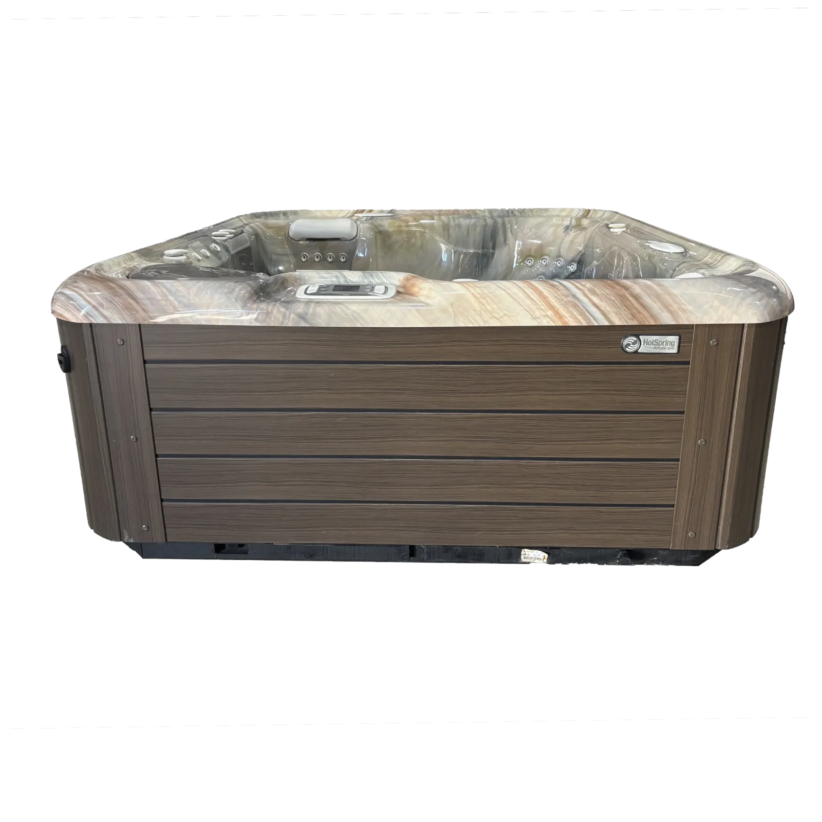 Modern outdoor hot tub with brown wood paneling and marble-effect interior, featuring multiple jets and controls.