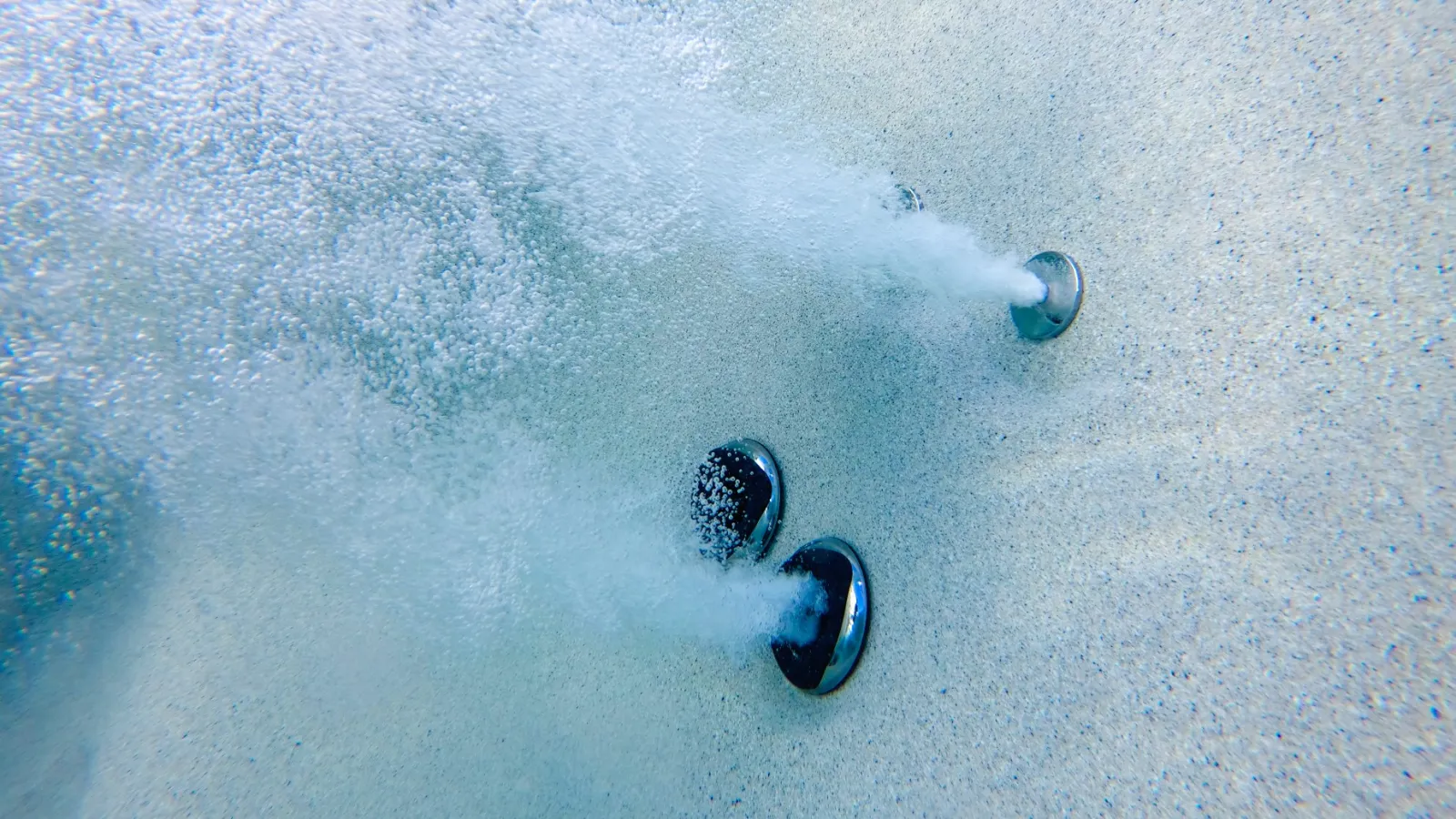 a group of bubbles in the water