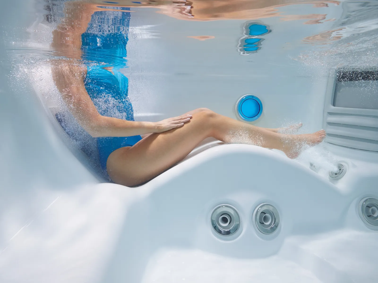 a woman in a hot tub