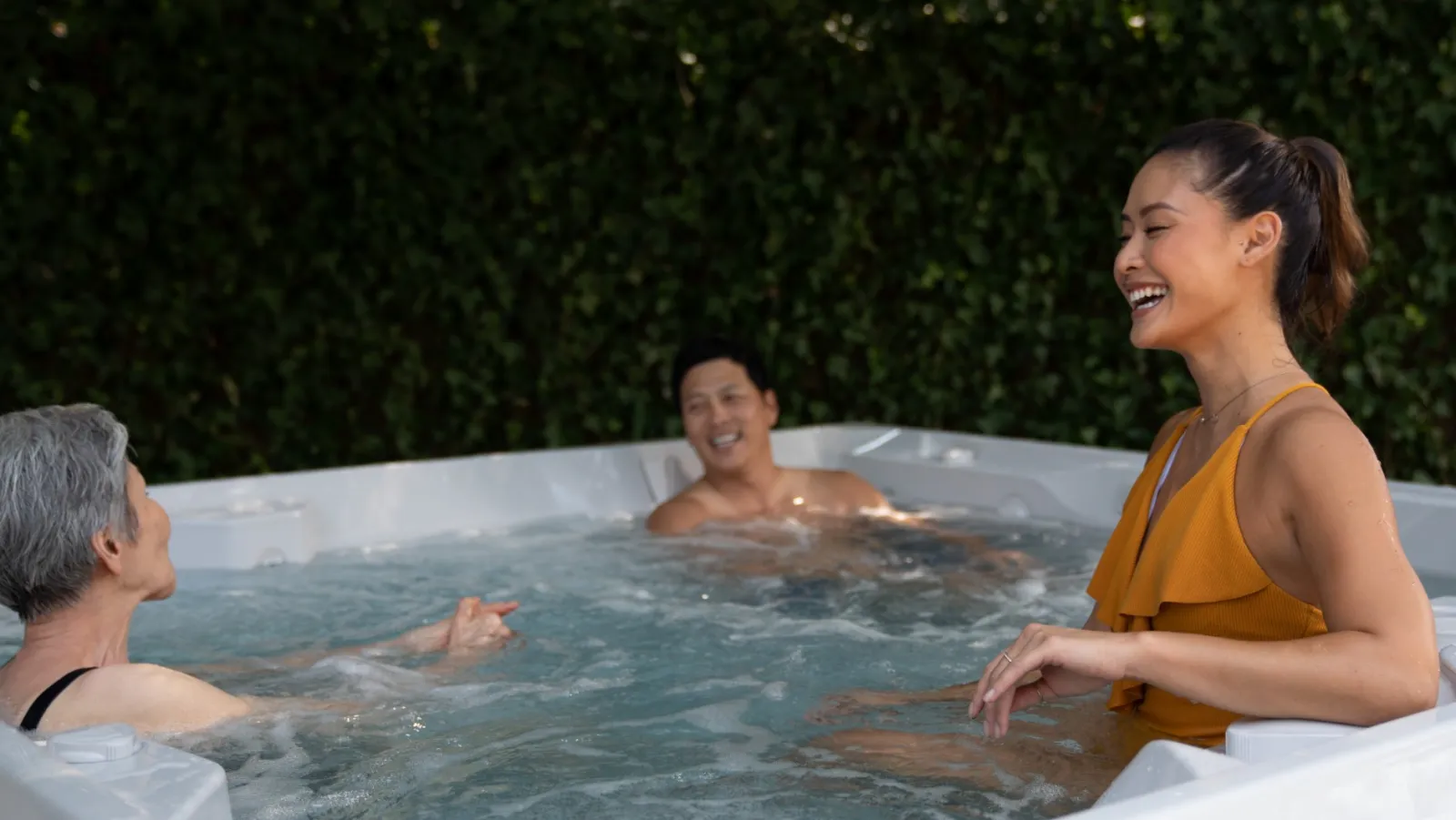 a group of people in a hot tub