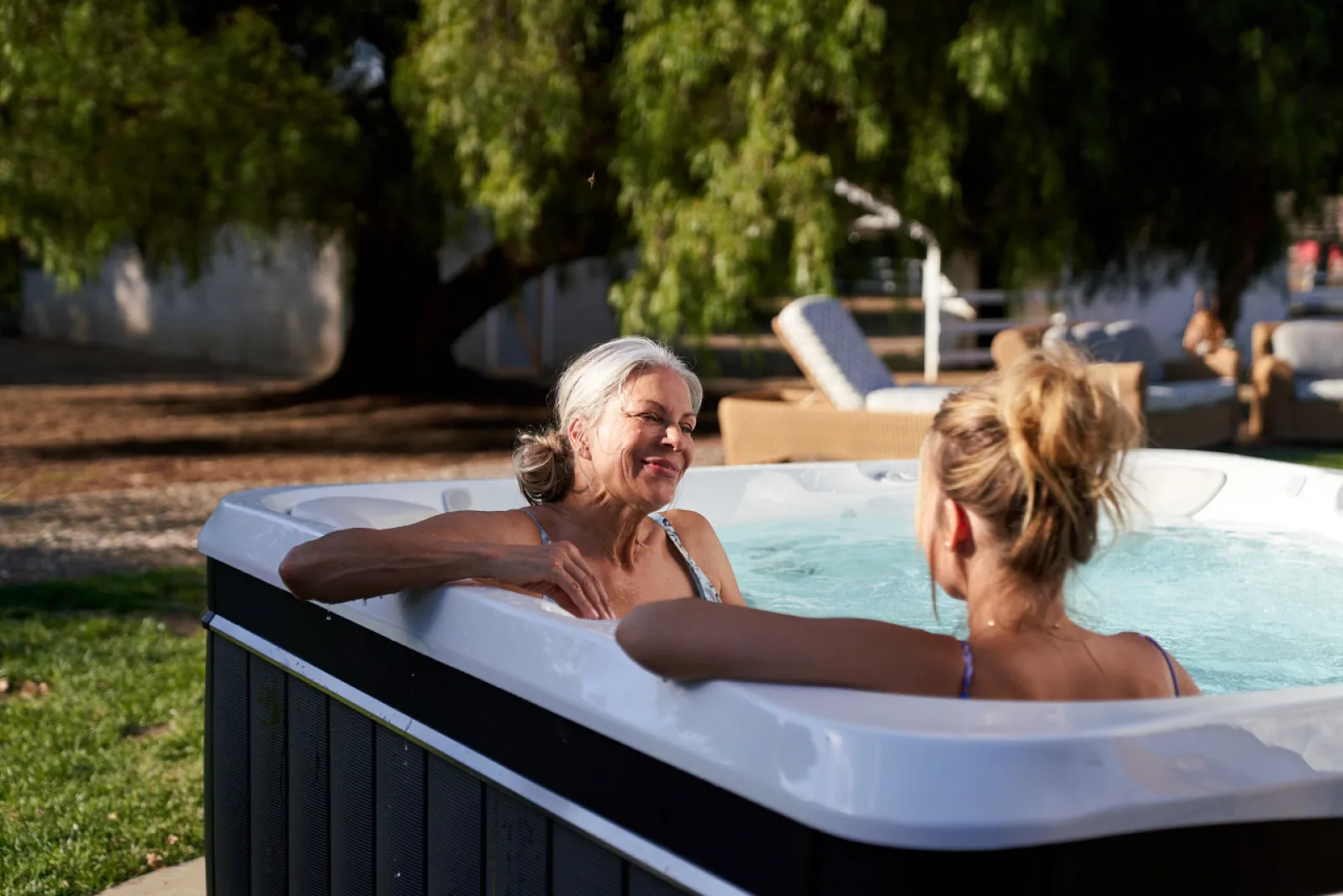 two women in a hot tub