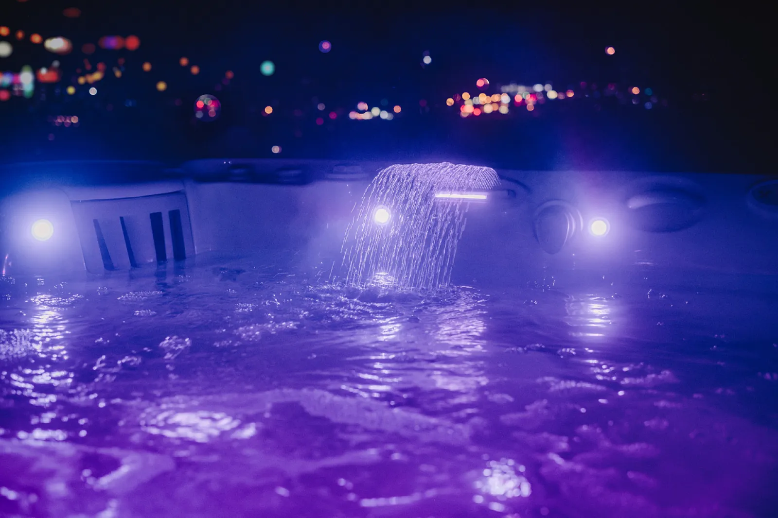 a hot tub with lights