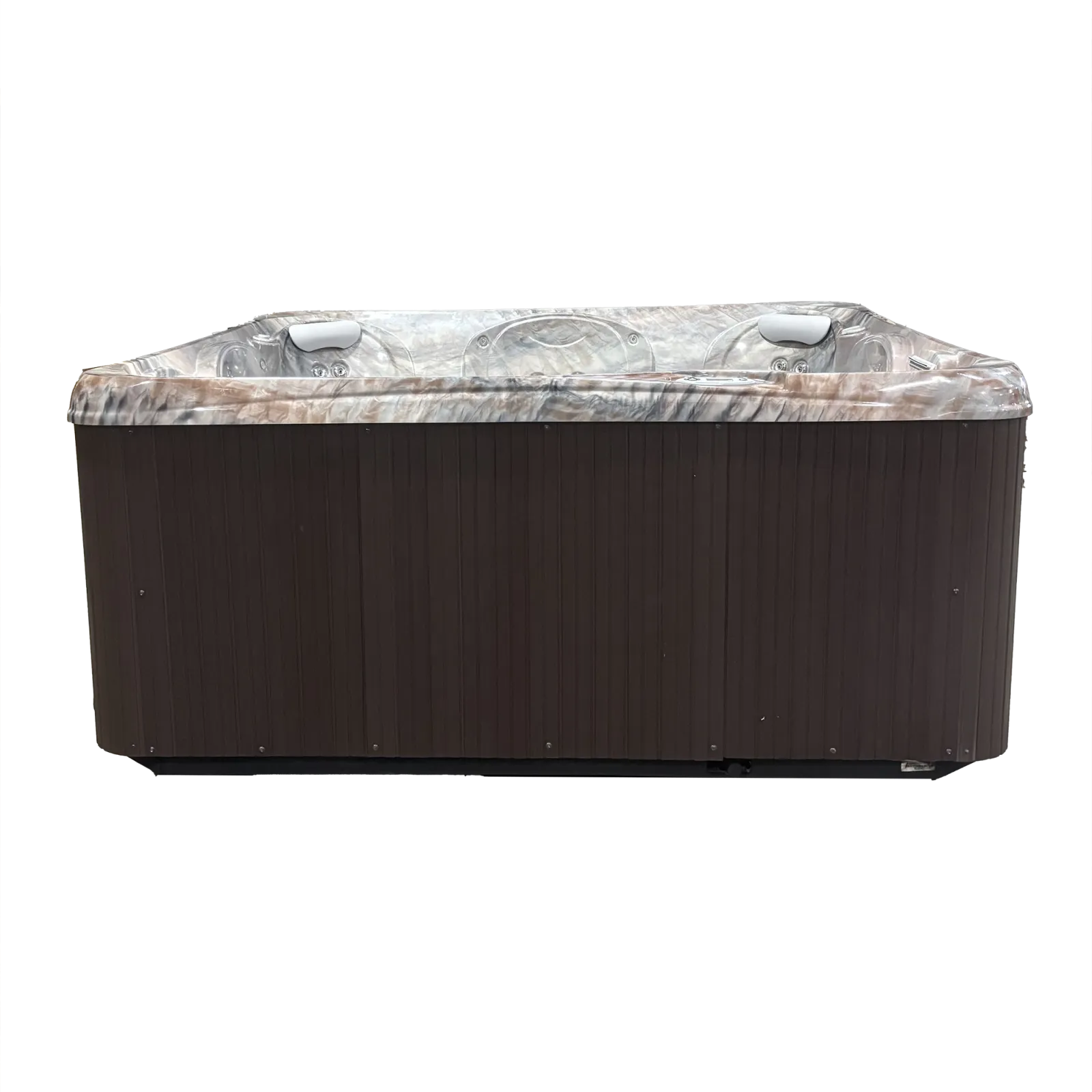 Outdoor hot tub with marble-patterned interior and dark brown exterior paneling with built-in headrests.