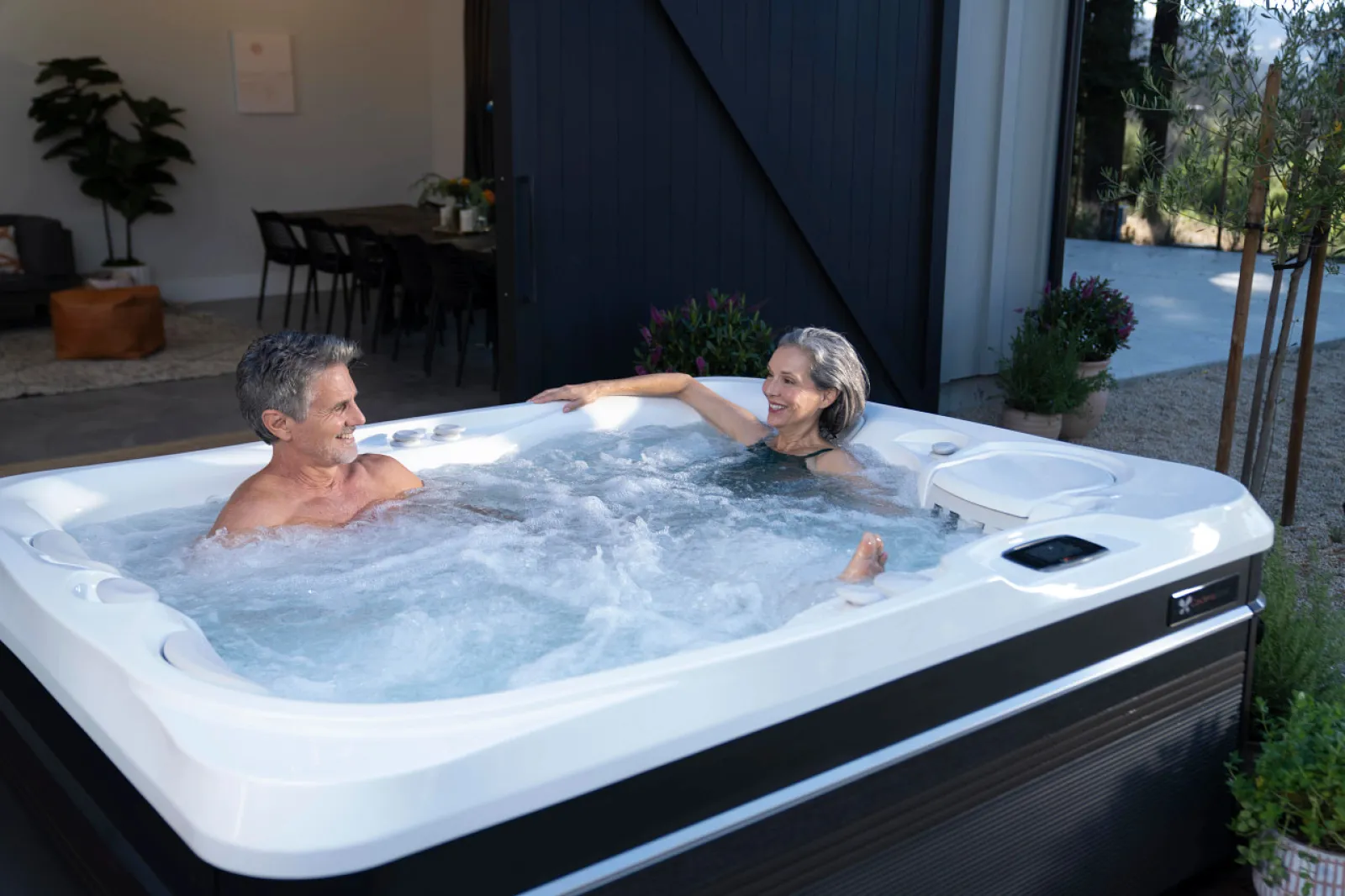 a man and woman in a hot tub