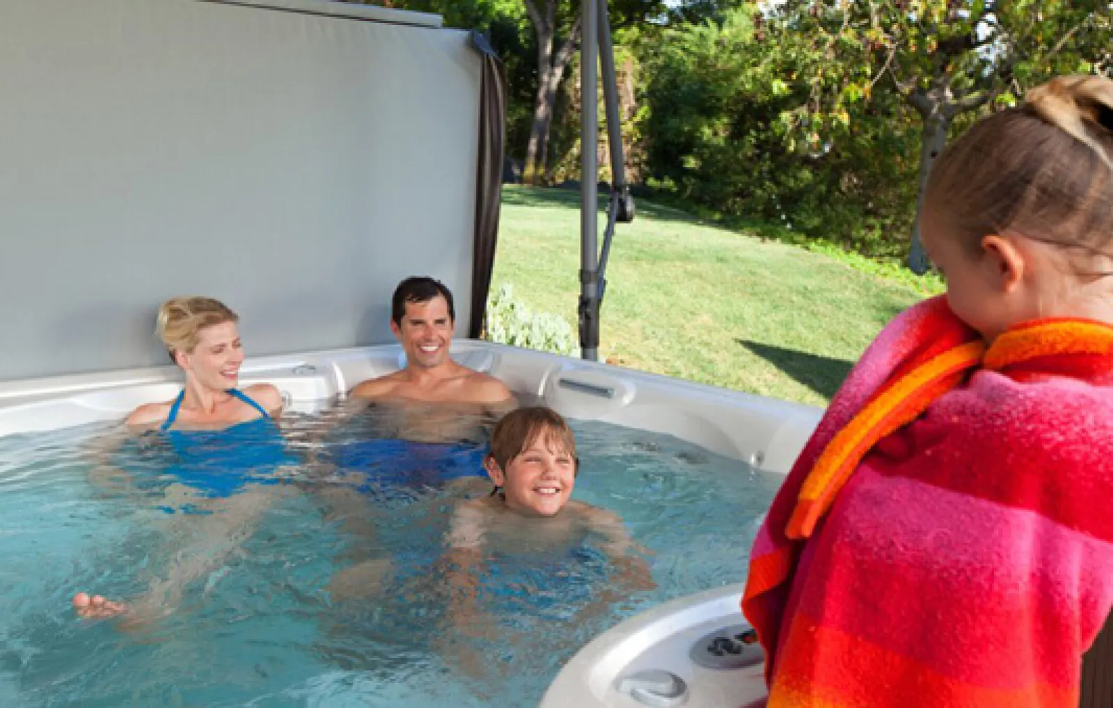 a group of people in a hot tub