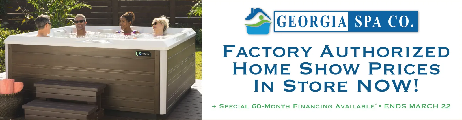 Four adults relaxing and chatting in an outdoor hot tub with wood steps beside it during daytime.