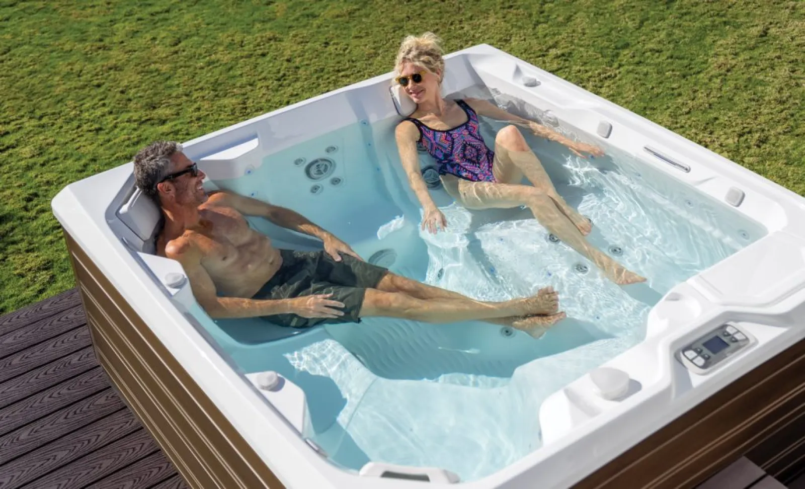 a man and woman in a hot tub