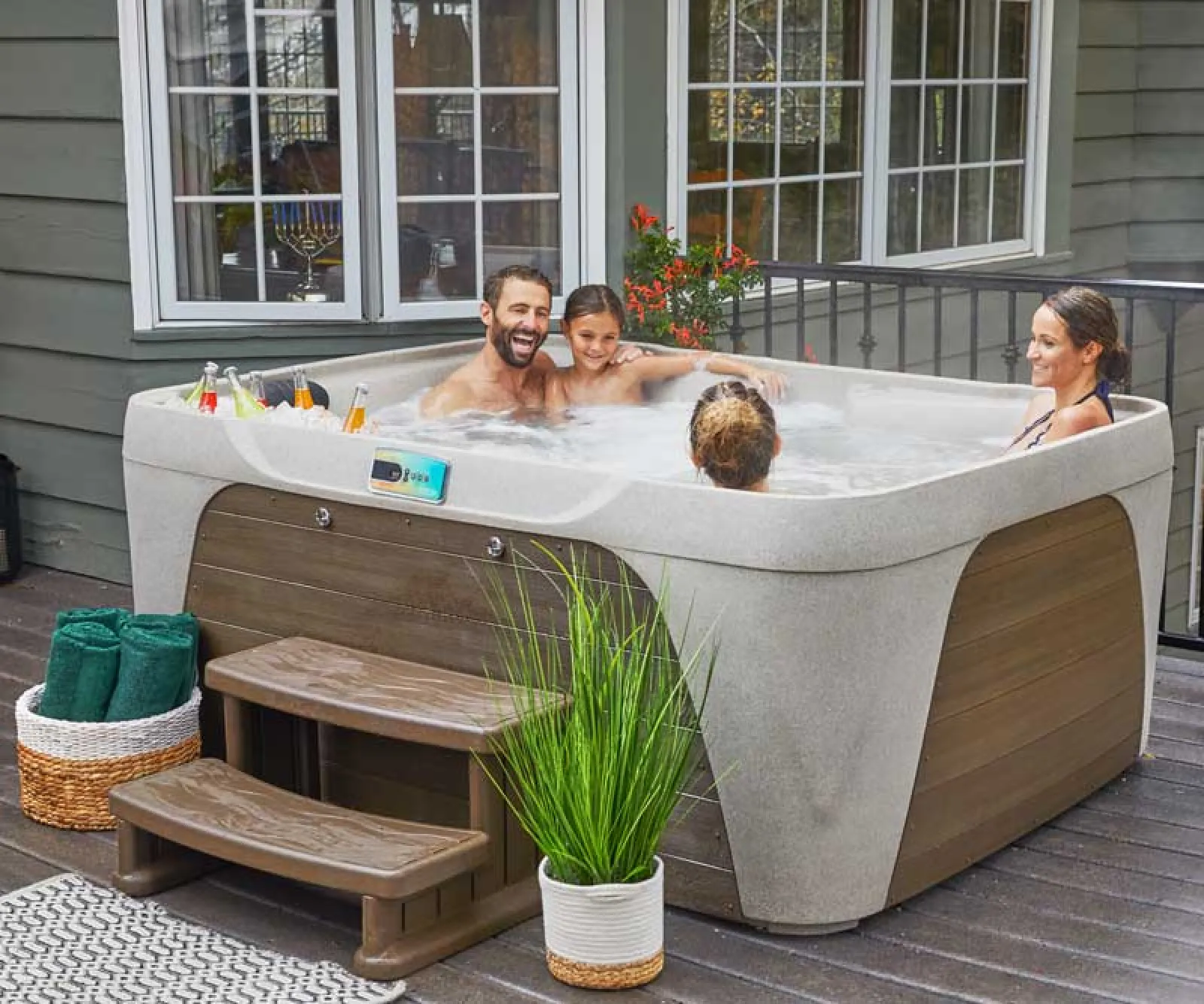 a group of people in a hot tub