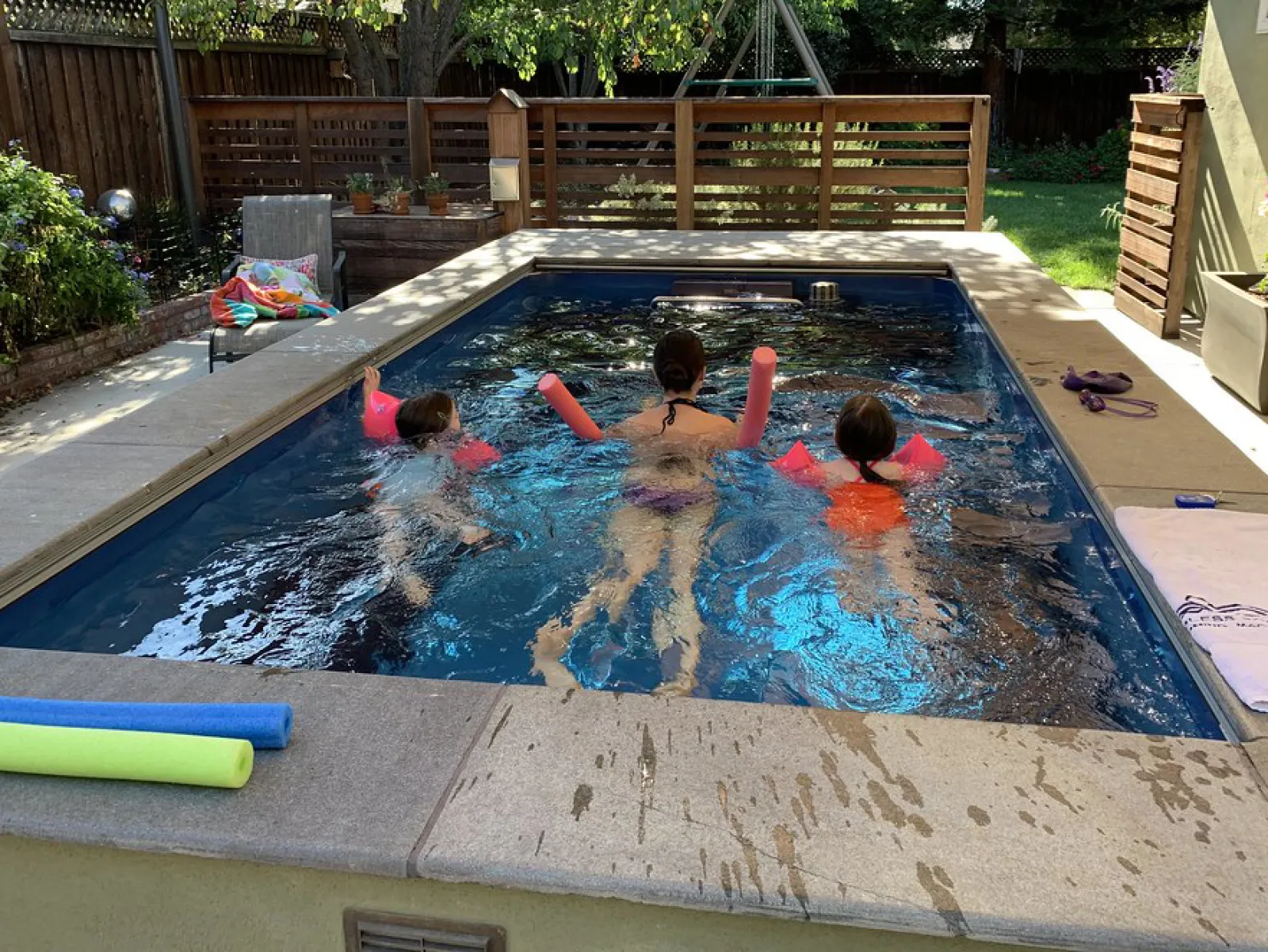 a group of people in a pool