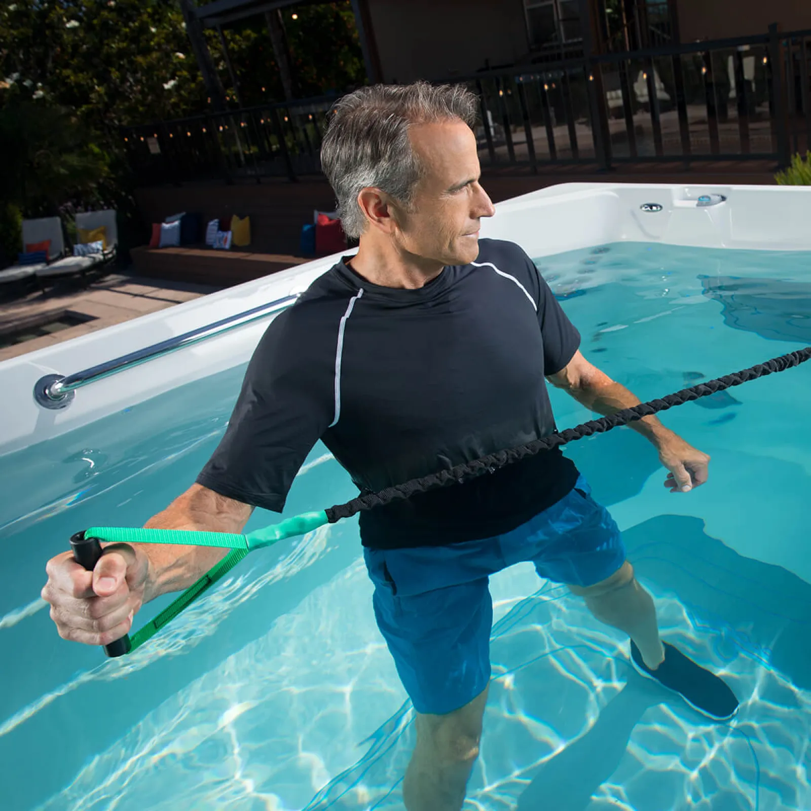 a man working out in a swim spa