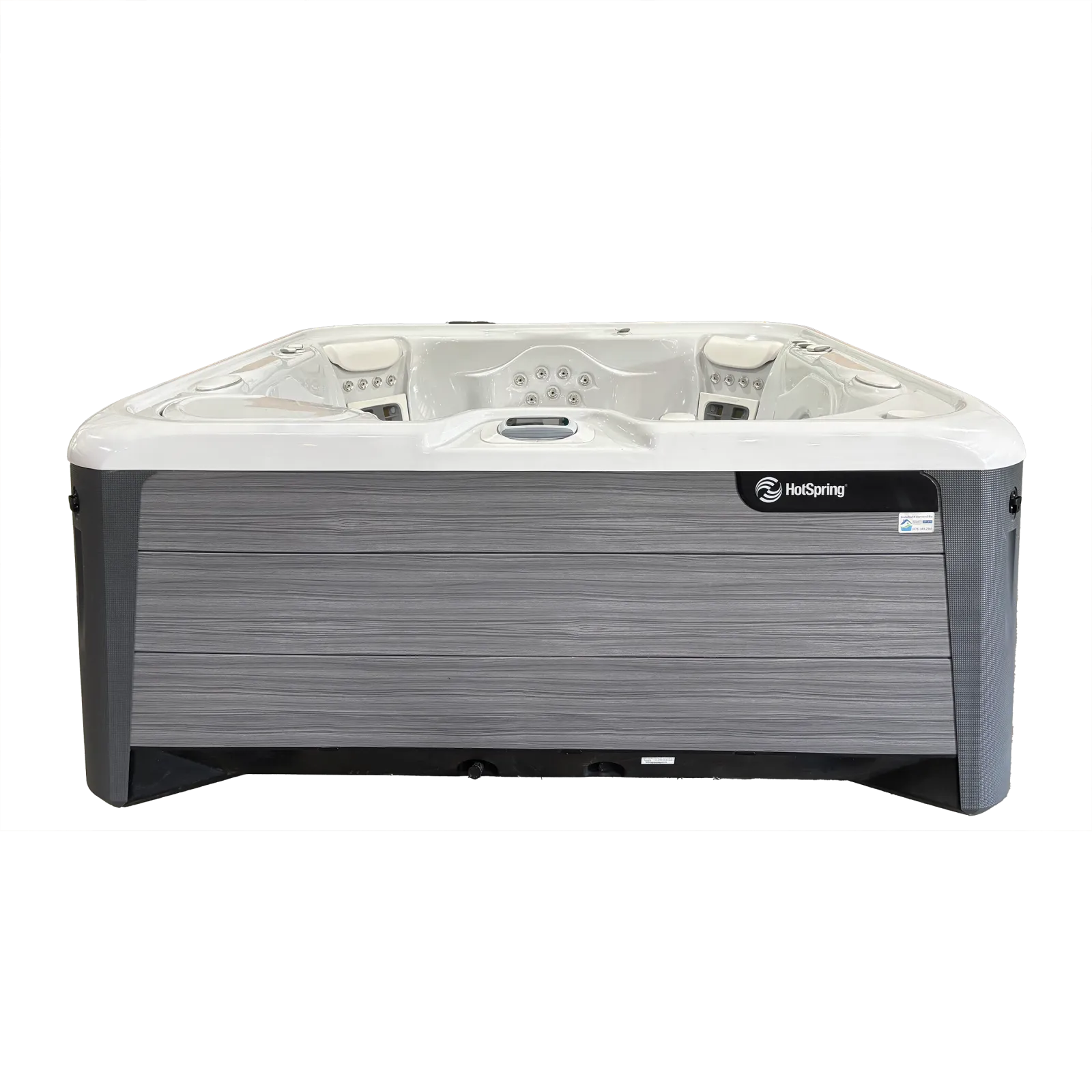 Modern HotSpring spa hot tub with gray exterior and white interior, featuring multiple jets and seating.