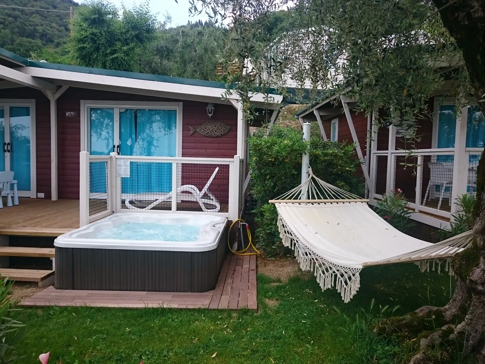 a small hot tub in a backyard
