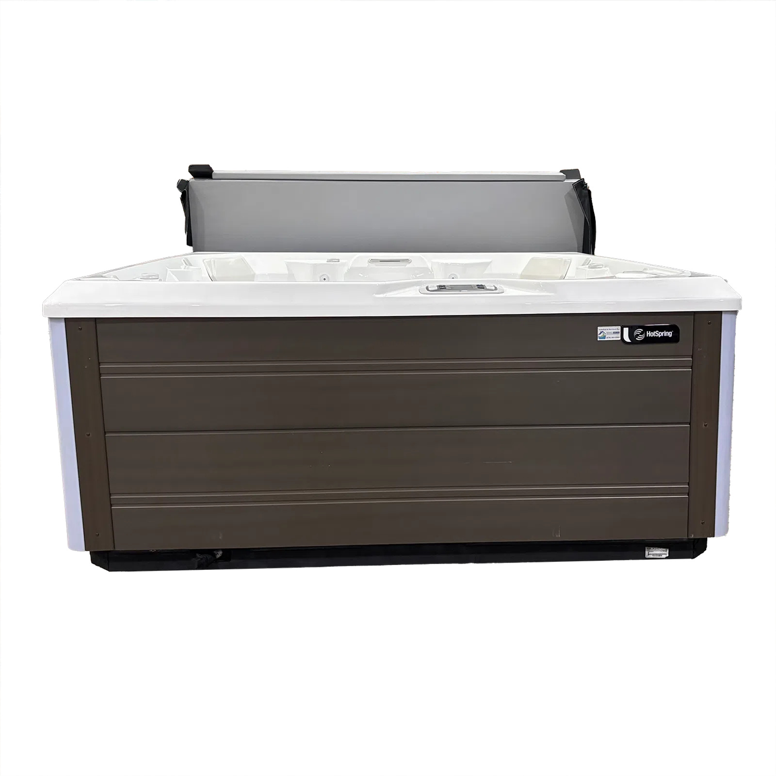 Modern rectangular hot tub with brown exterior panels and white interior, featuring a partially open cover.
