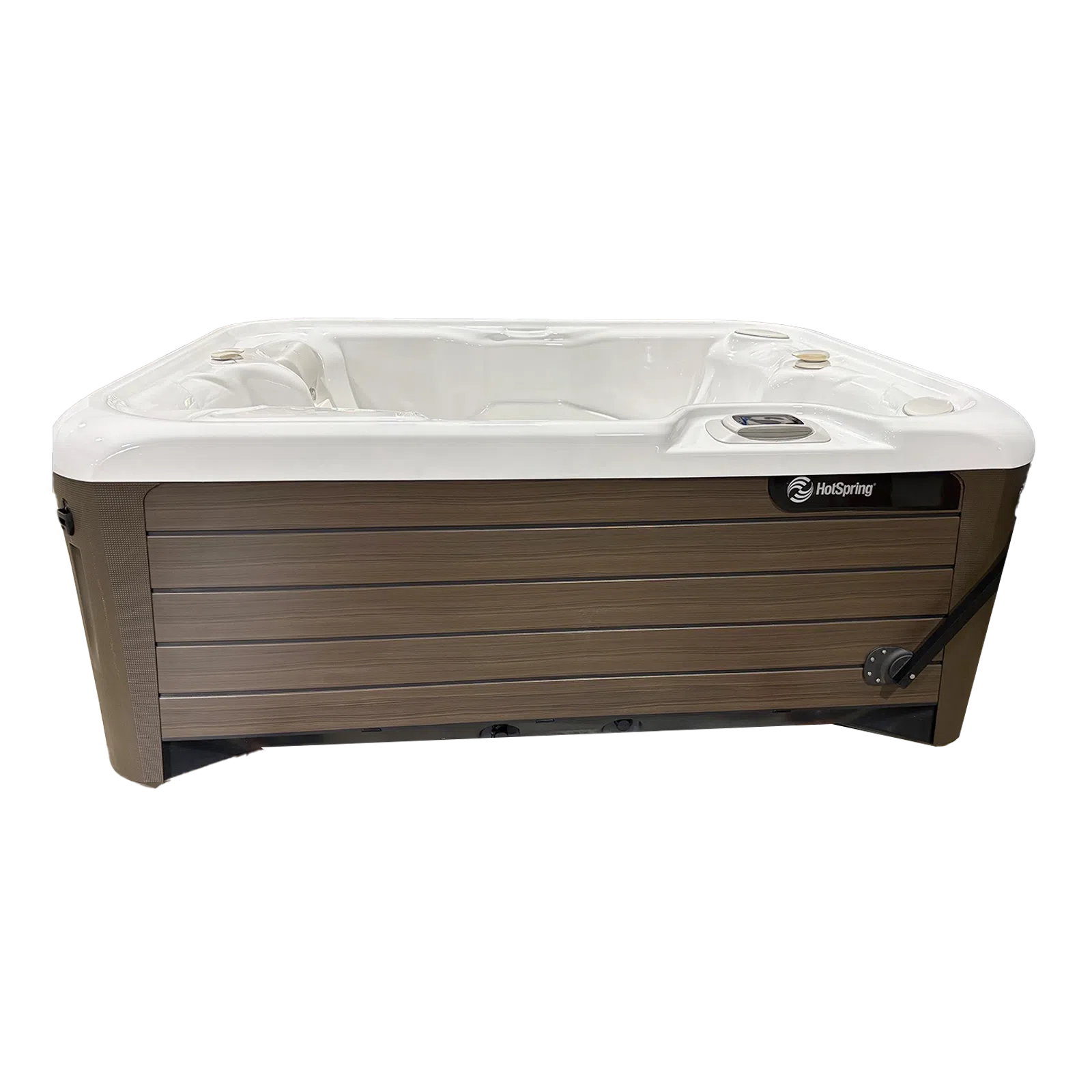 a white rectangular object with a black bag on top of it