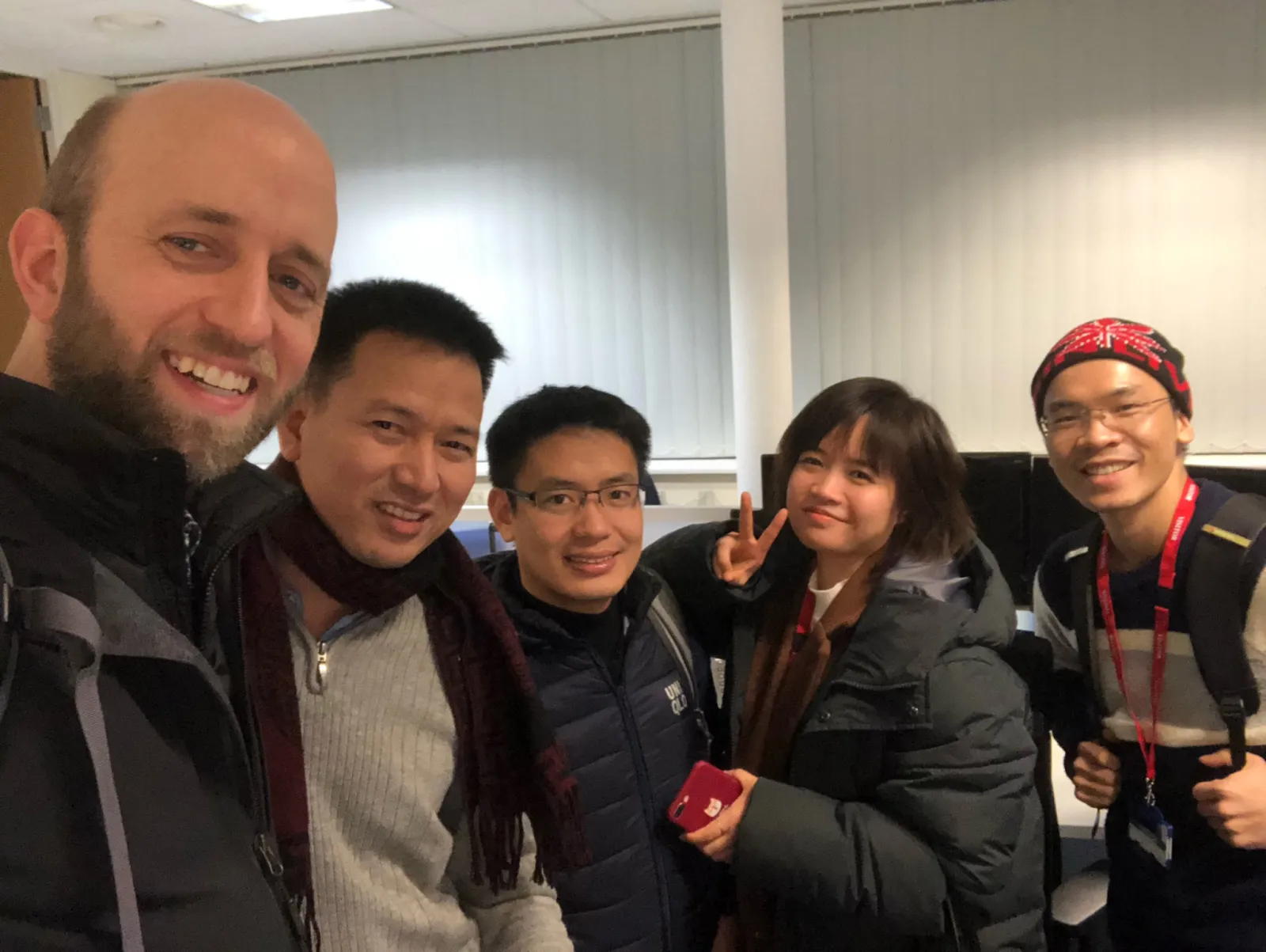 a group of people posing for a photo