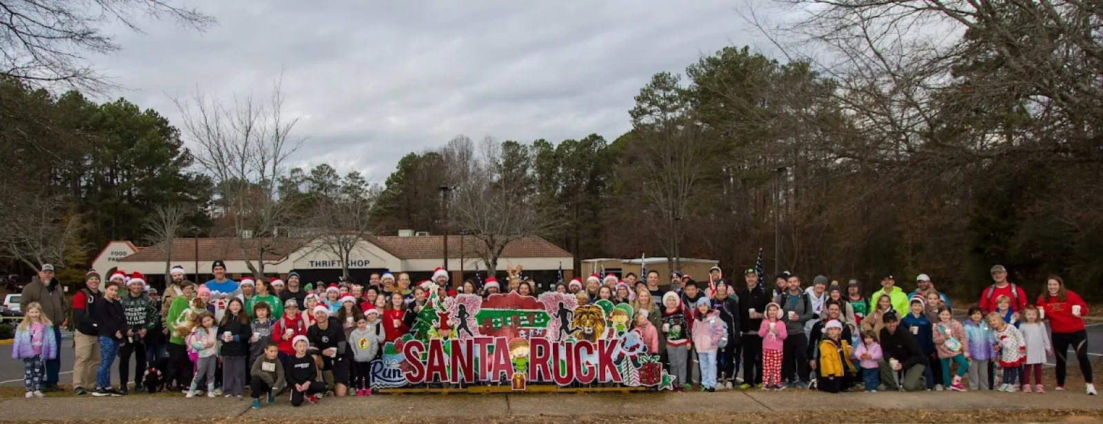 a group of people holding a sign