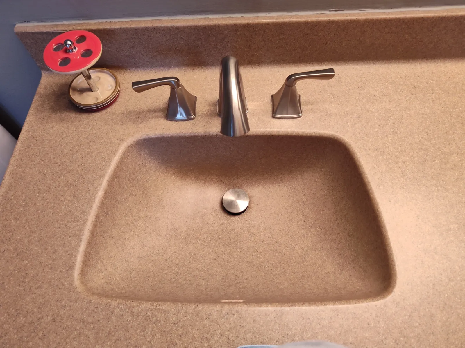 a round metal object with buttons