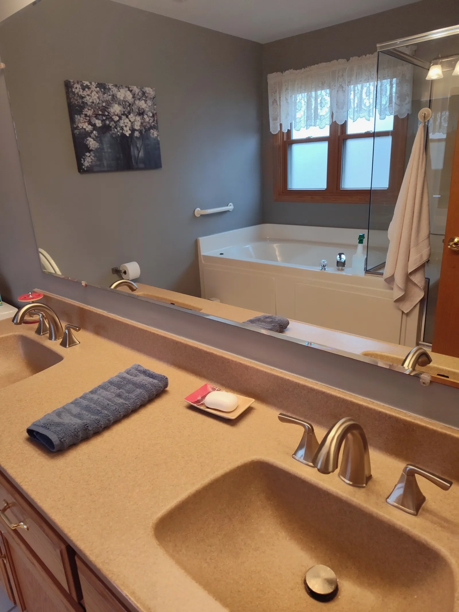 a bathroom with a tub and sink