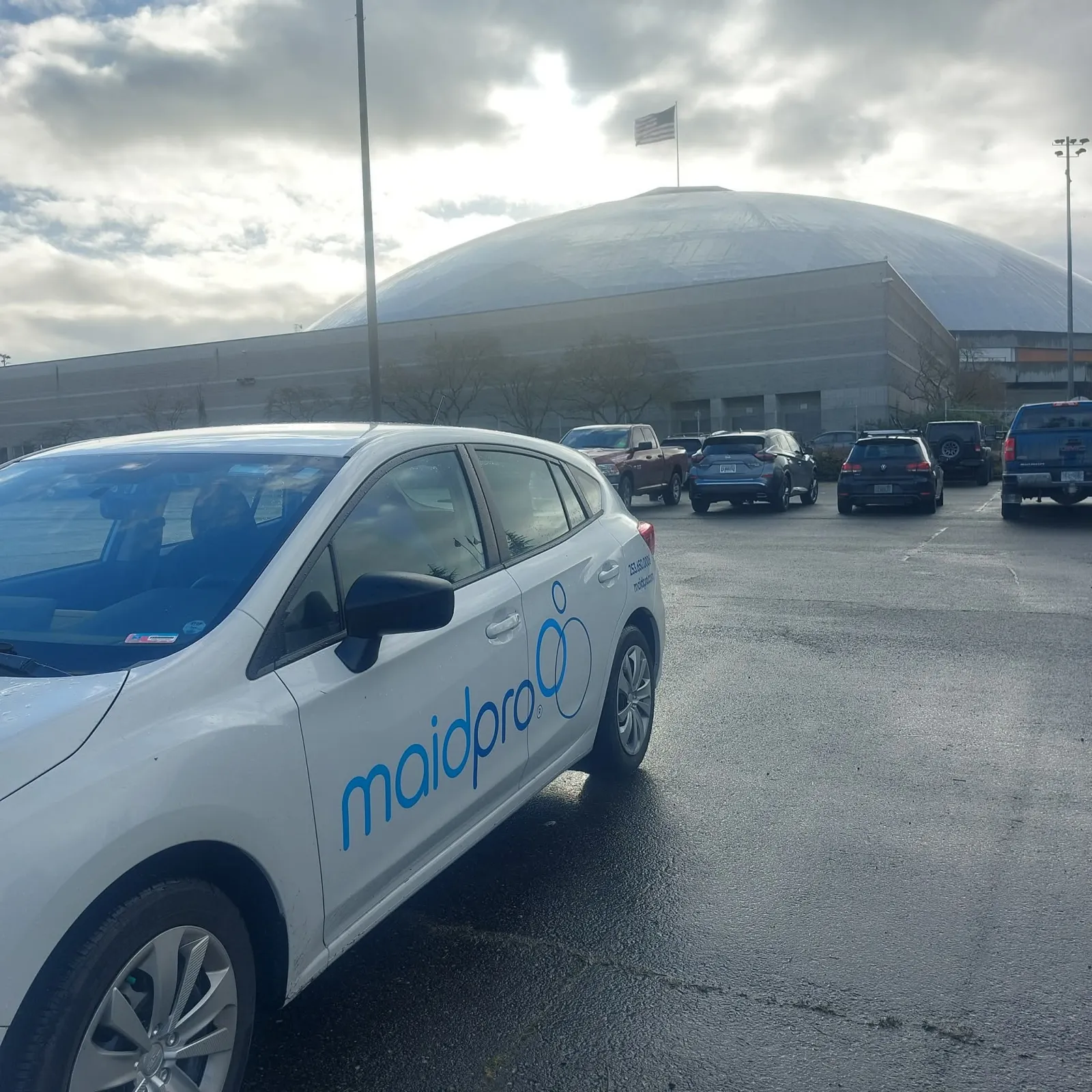 MaidPro branded car parked in lot Tacoma, Washington
