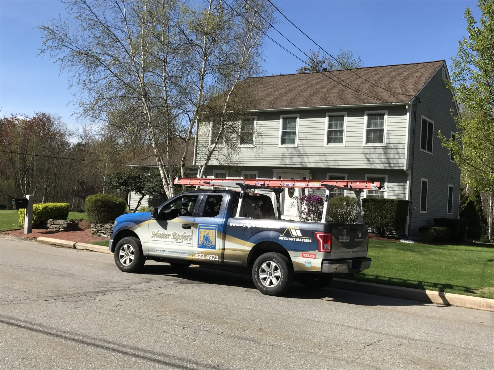 a police car parked in front of a house