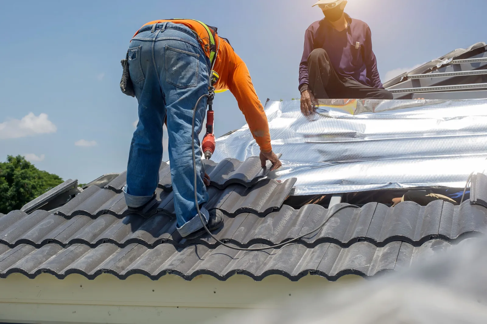 Workers working on roof