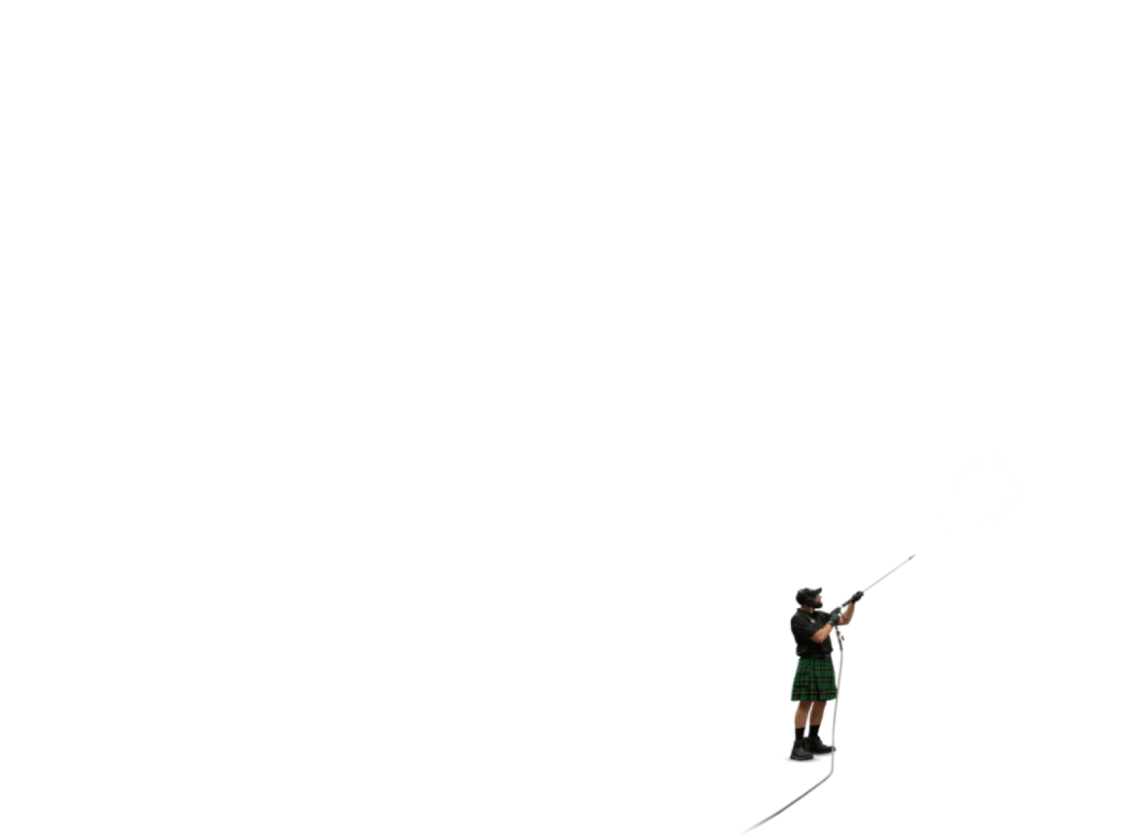 Man in kilt playing a long wooden horn with a plume of white smoke or sound coming out.