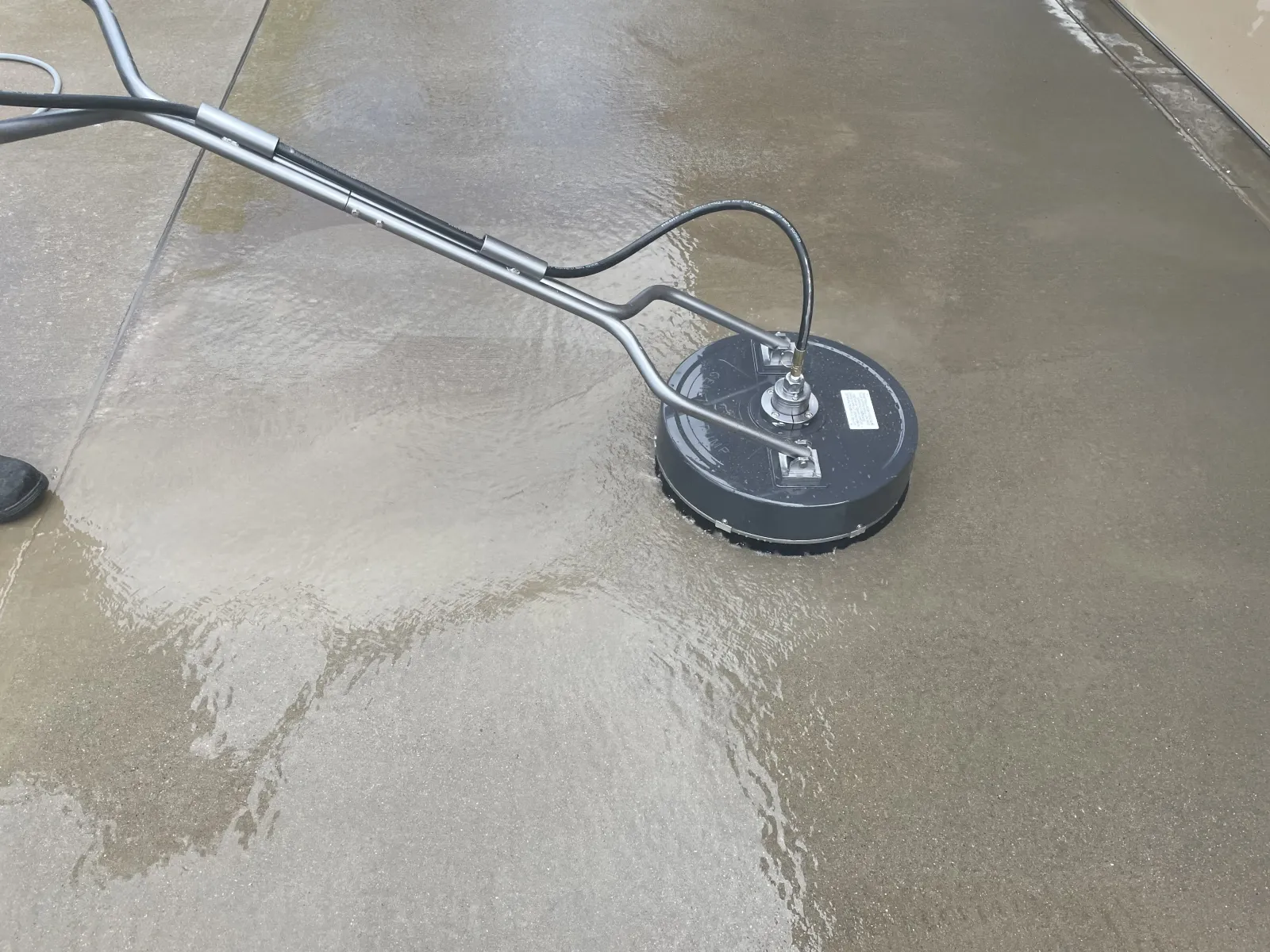 a black and silver object on a grey surface