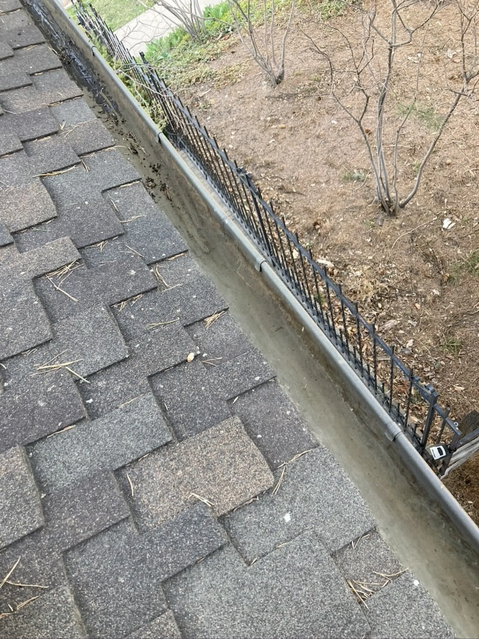 a pipe on a brick walkway