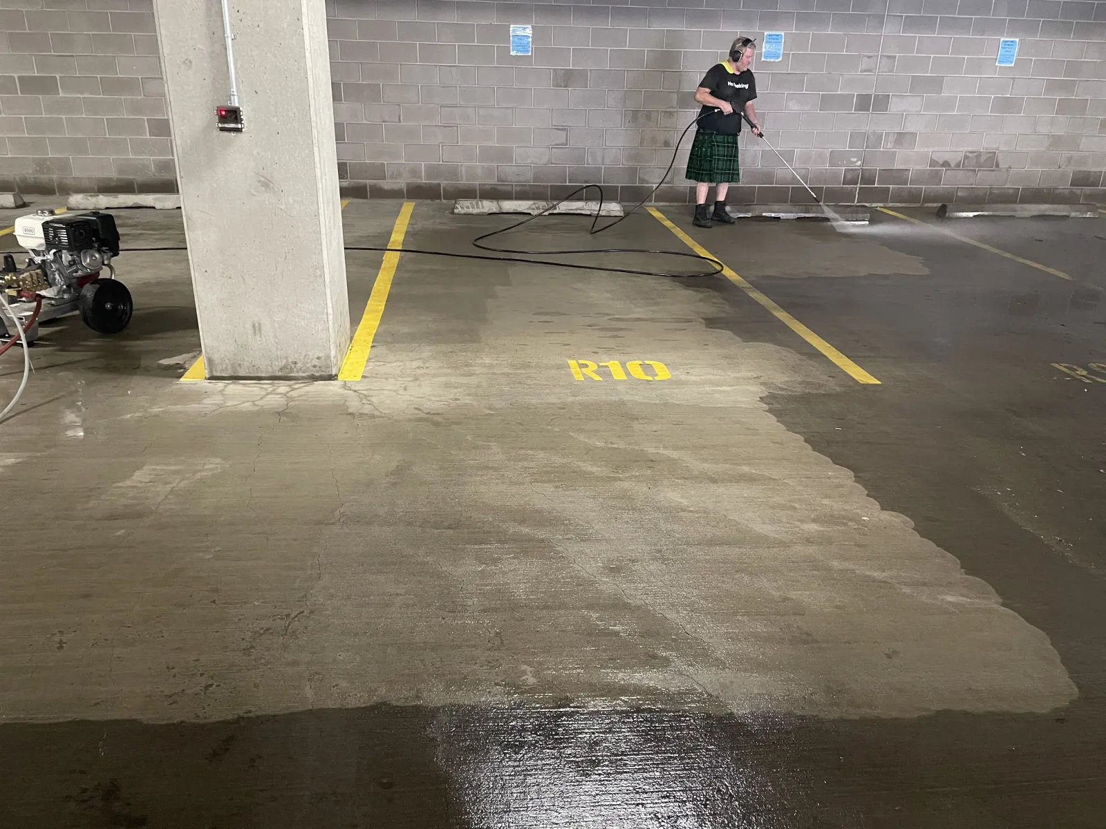 a man walking in a parking lot