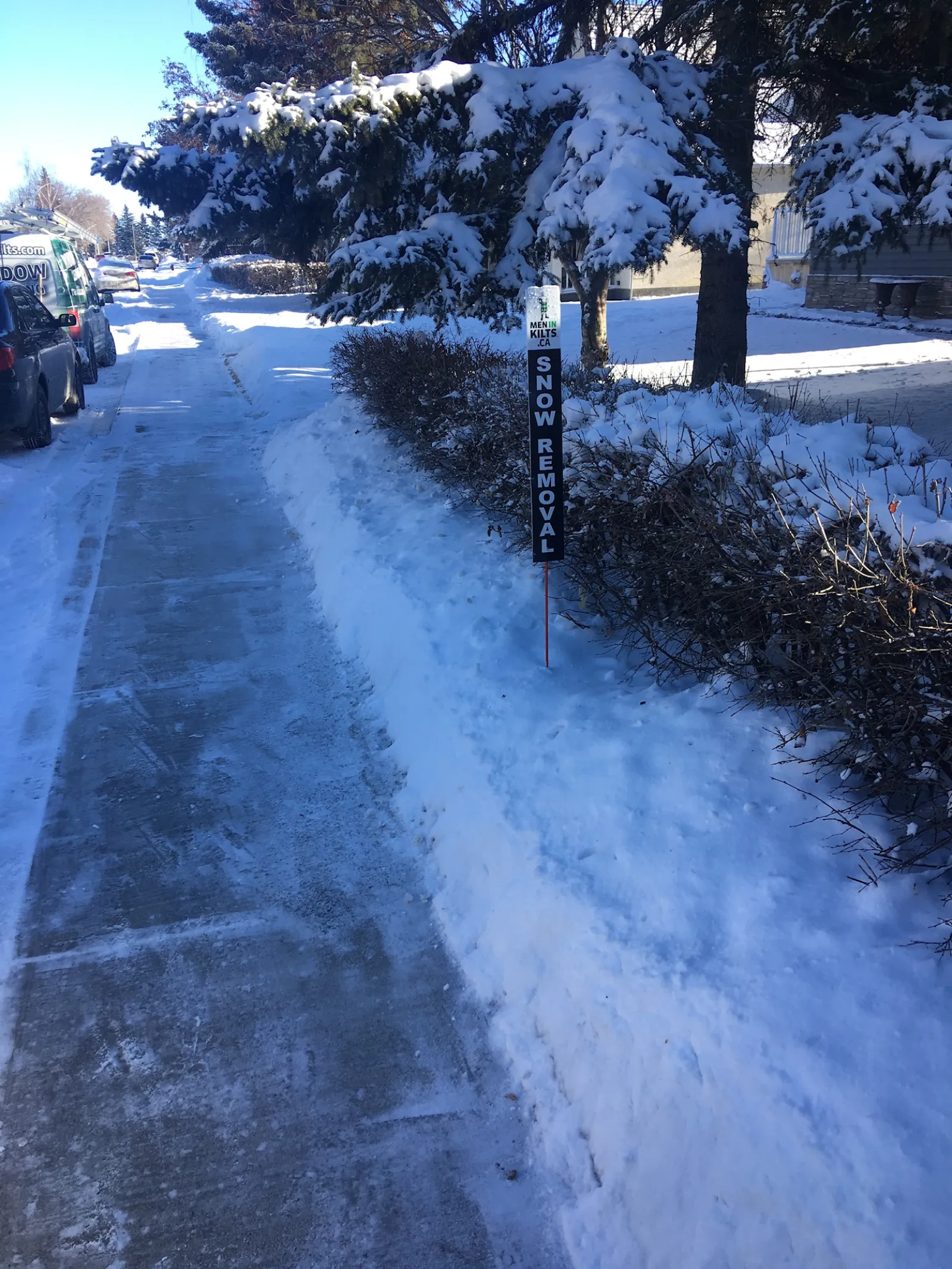 a road with snow on the side