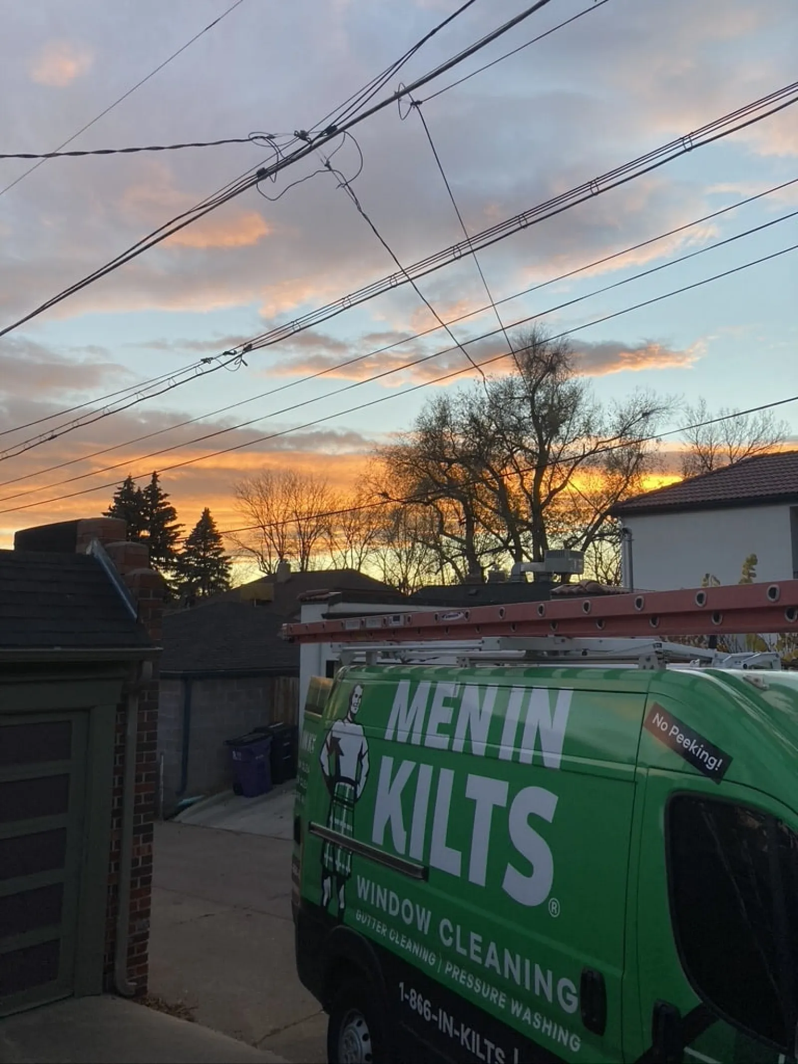 a green van parked on a street