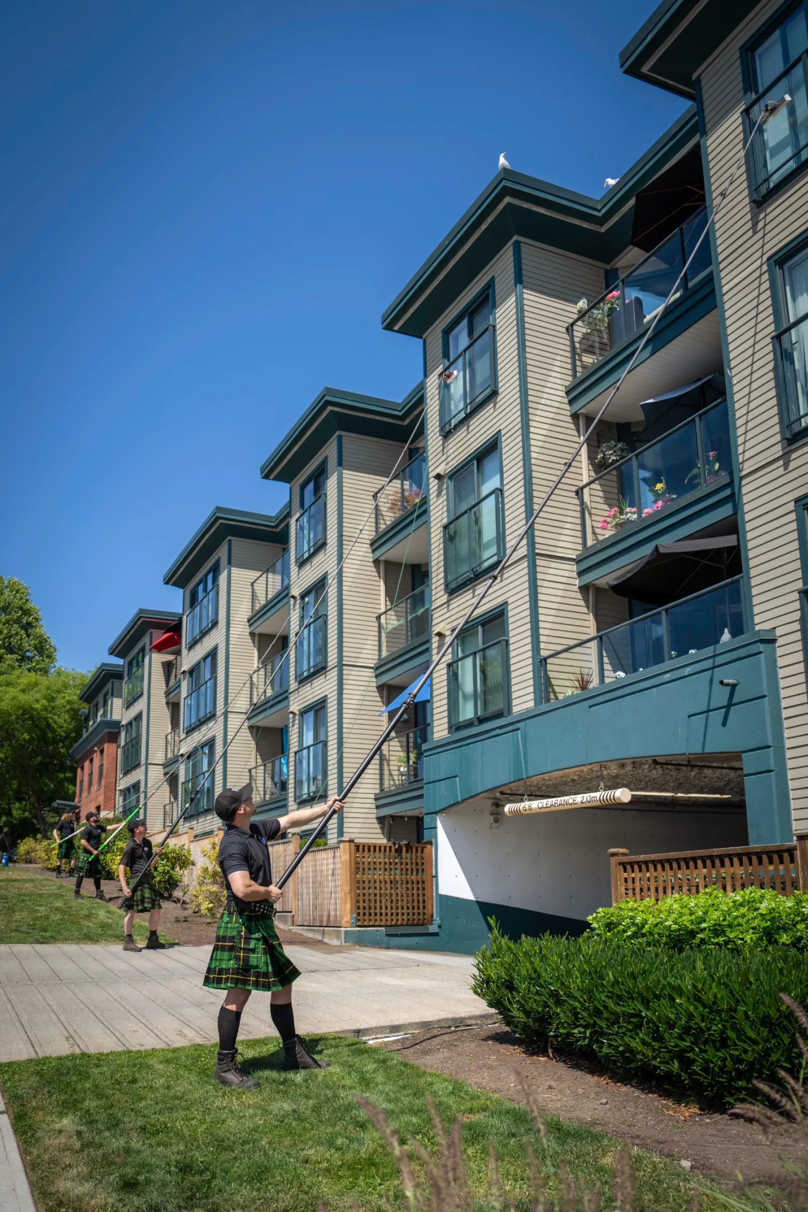 a person standing in front of a row of houses