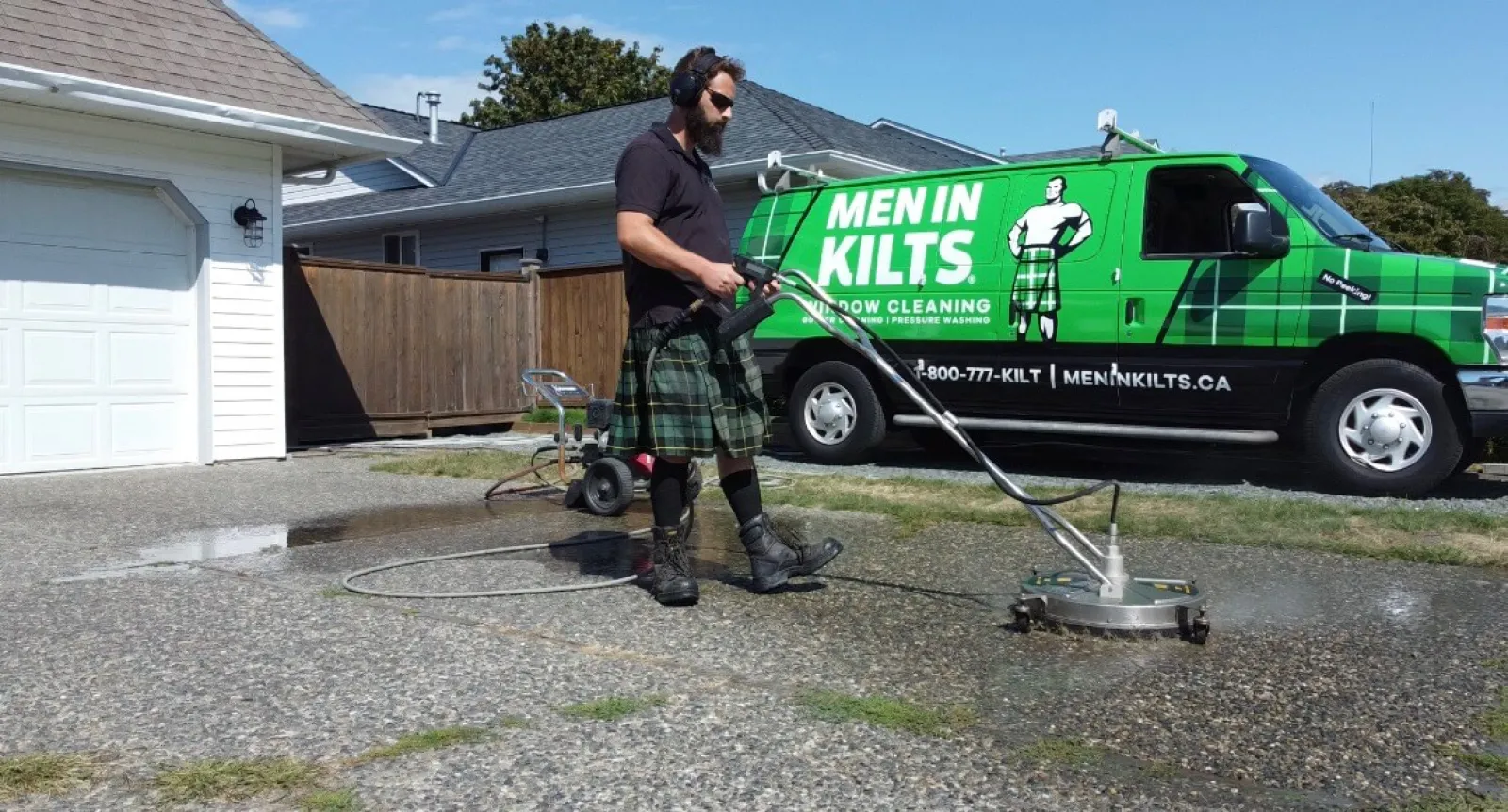 a person holding a large green machine