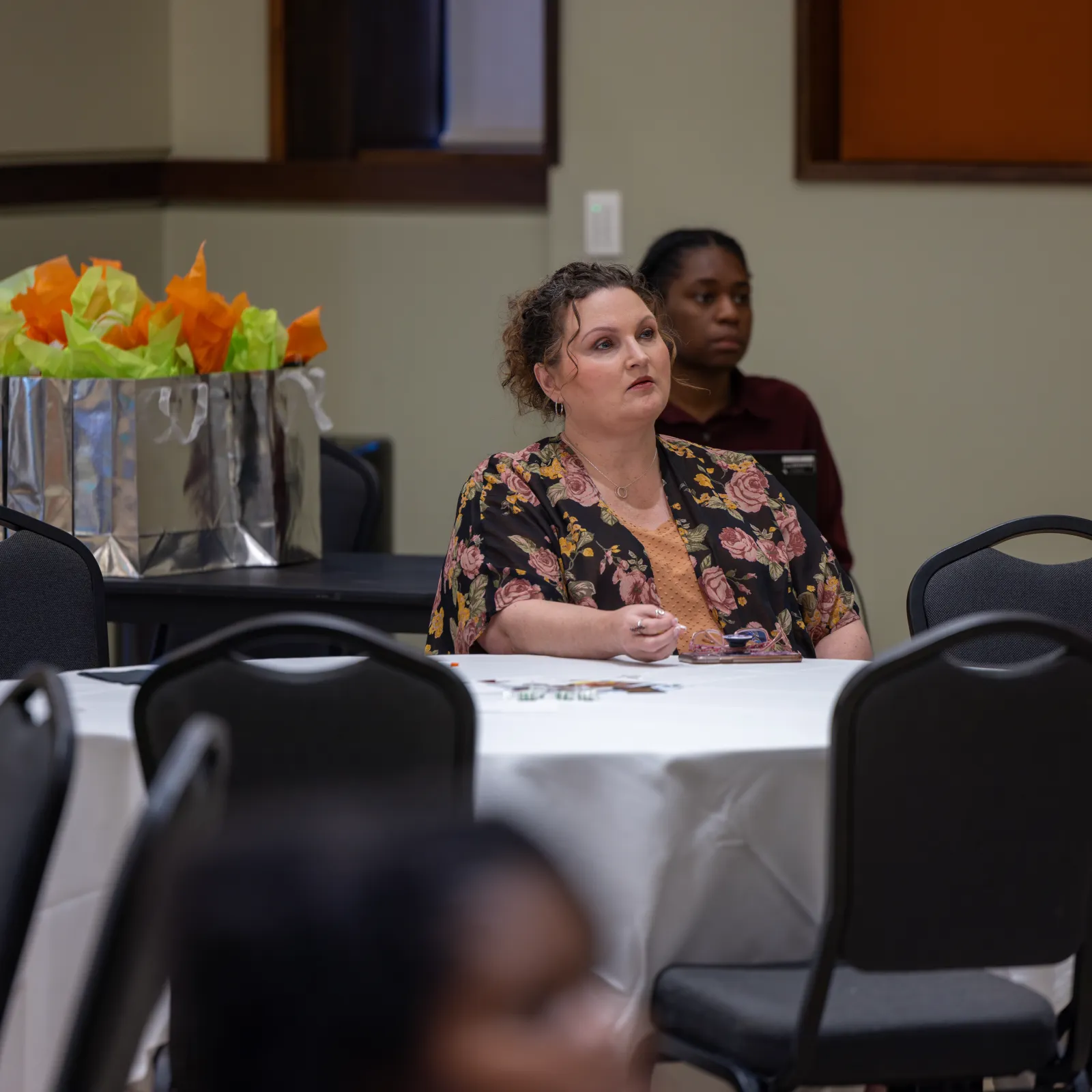 a woman and a man sitting at a table